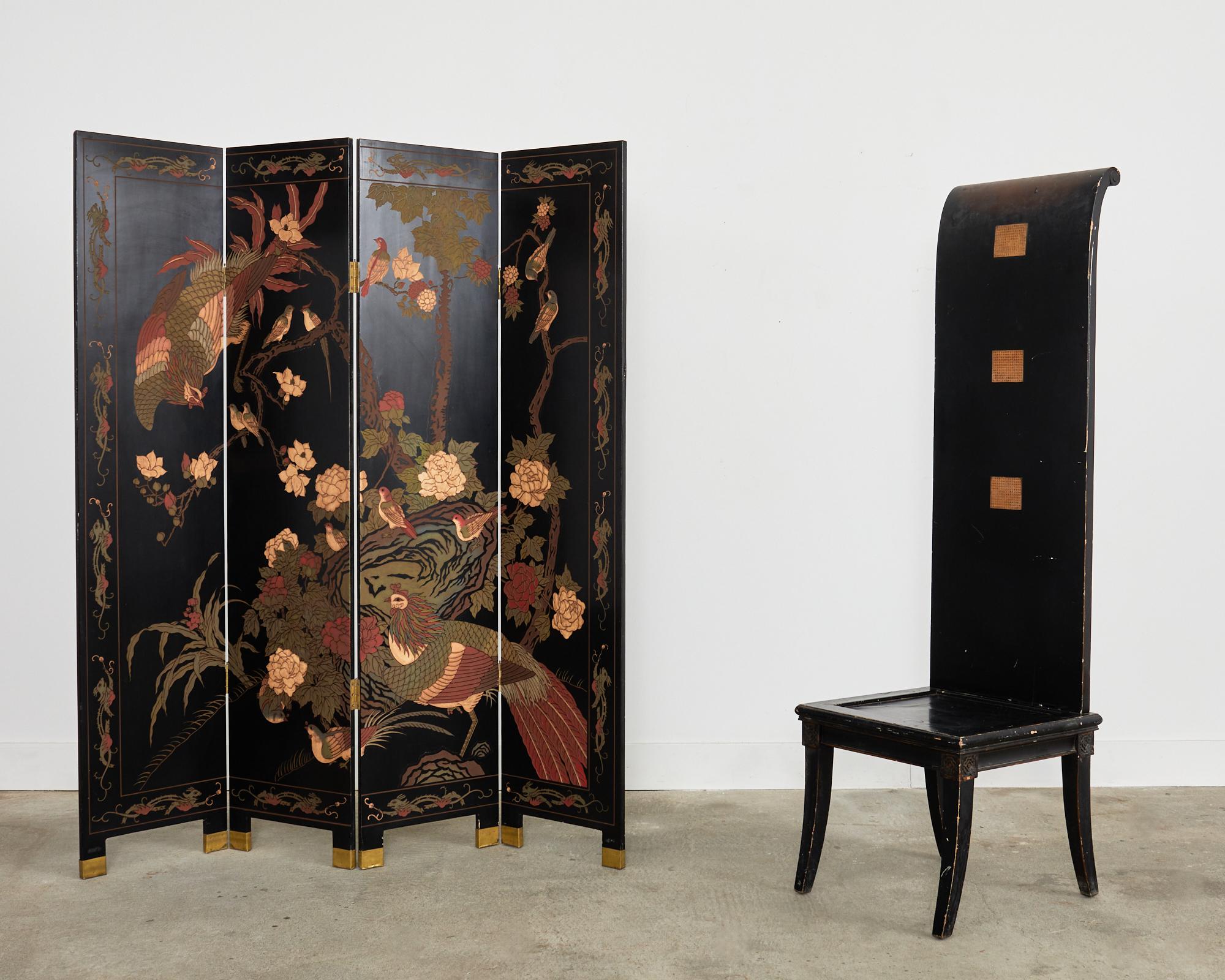 Gorgeous 20th century Chinese export four-panel coromandel screen featuring a landscape scene of flora and fauna. The lacquered panels are incised and painted with vibrant color pigments having a desirable faded patina. Decorated with large white