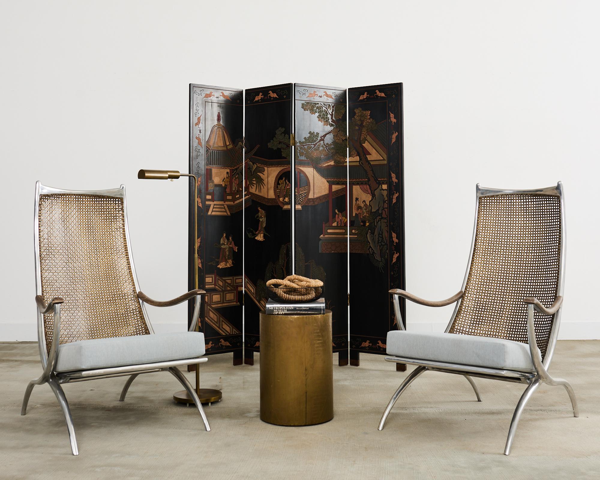 Distinctive Chinese export four-panel coromandel screen depicting a walled pavilion with figures engaged in leisurely activities. The scene appears to be from the 18th century Qing dynasty novel by Cao Xuegin, the dream of the red chamber the view