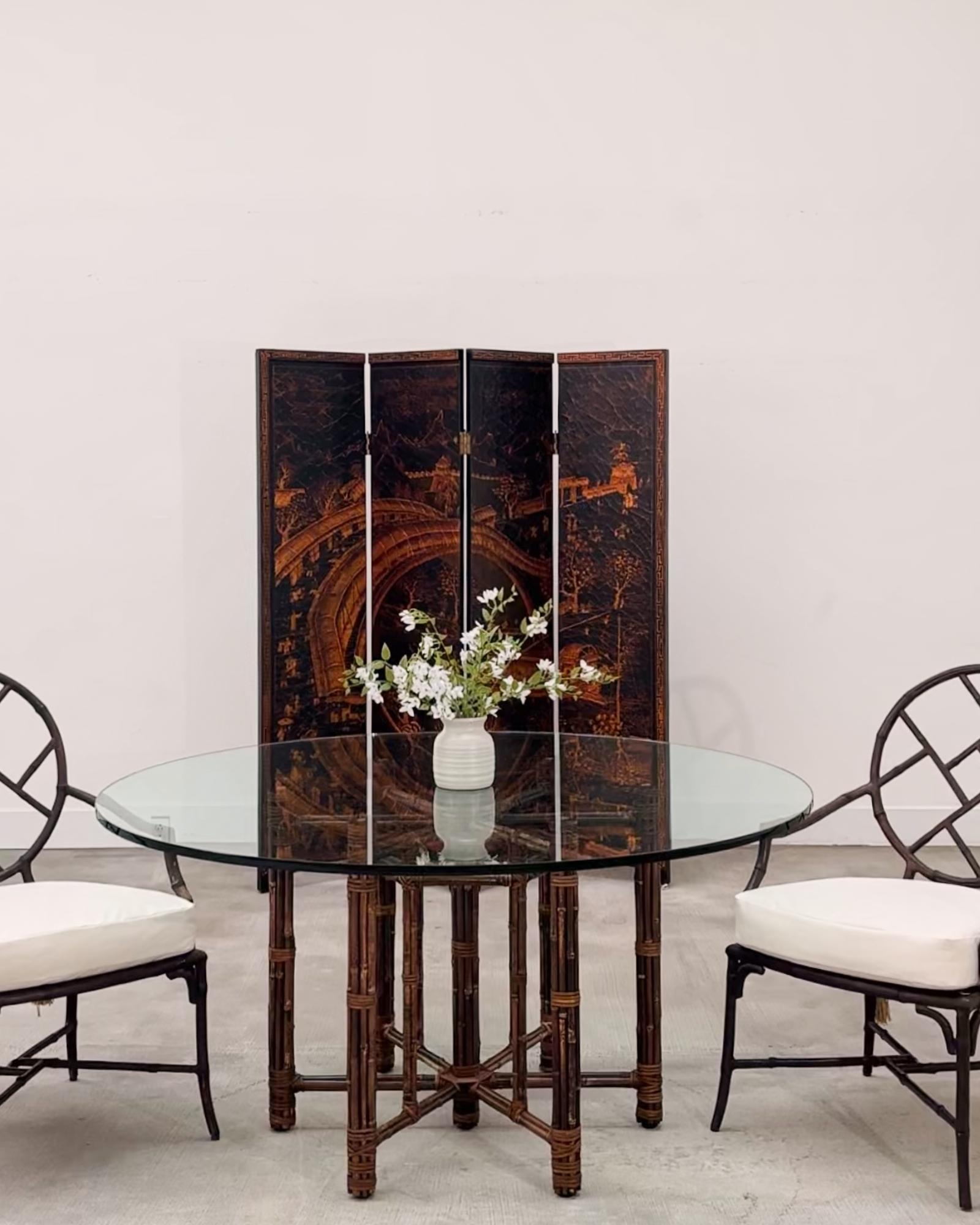 Late 20th century Chinese export four-panel folding coromandel style screen crafted from thick lacquered wood panels. The screen depicts a painting of an ancient Chinese bridge in a dark golden bronze. The lacquer finish has an intentionally