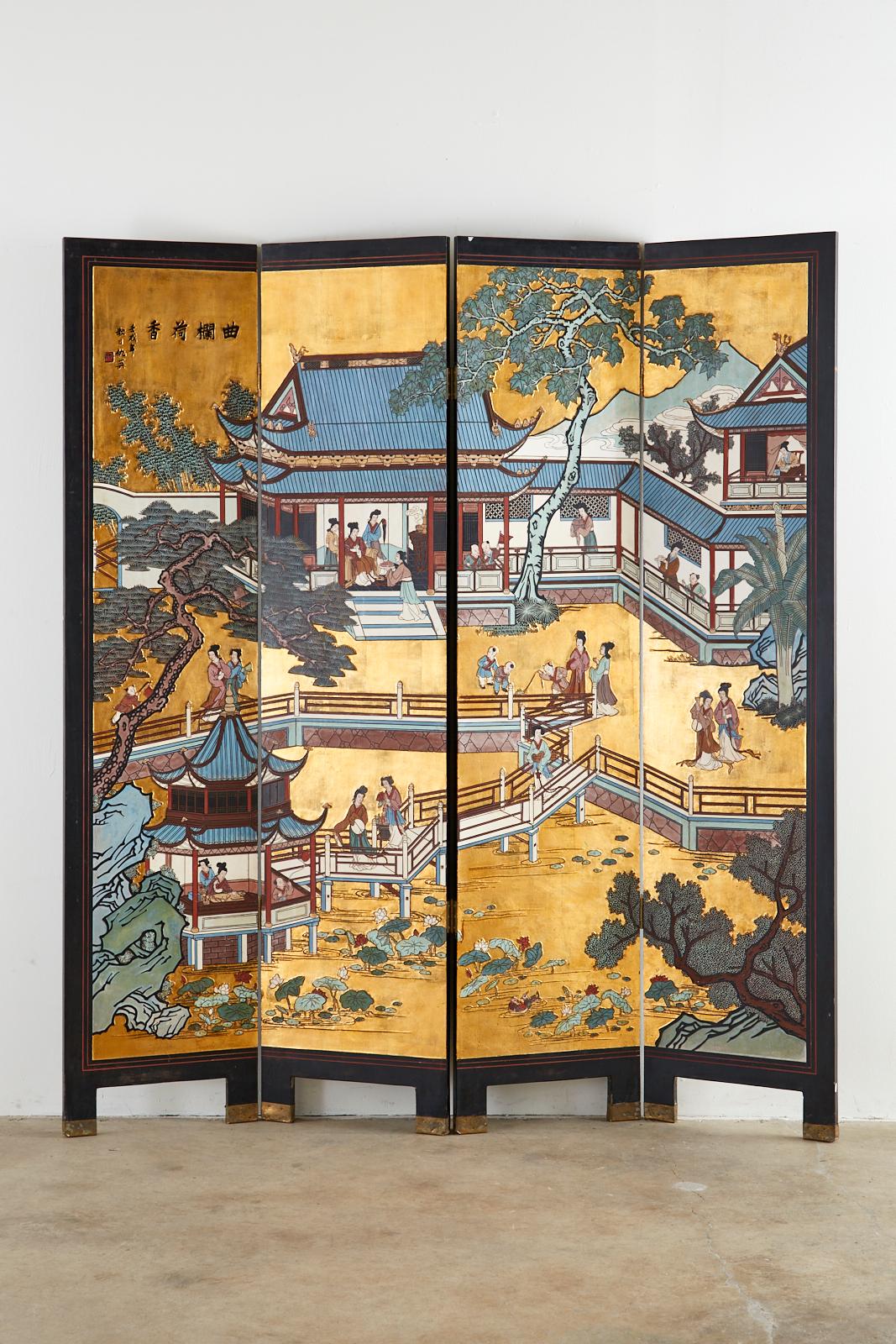 Fantastic Chinese export four-panel Coromandel screen featuring a stunning gold leaf background. The black lacquered hardwood panels are incised with vibrant color depicting an idyllic landscaped courtyard. Colorful pagodas and trees decorate the