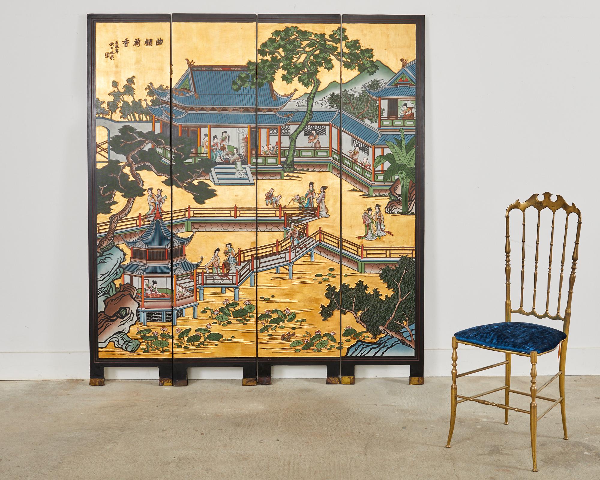 Extraordinary Chinese export four-panel coromandel screen featuring a pagoda pavilion landscape with a dramatic gold leaf background. The black lacquered panels are incised with vibrant color pigments depicting a courtyard with figures engaged in