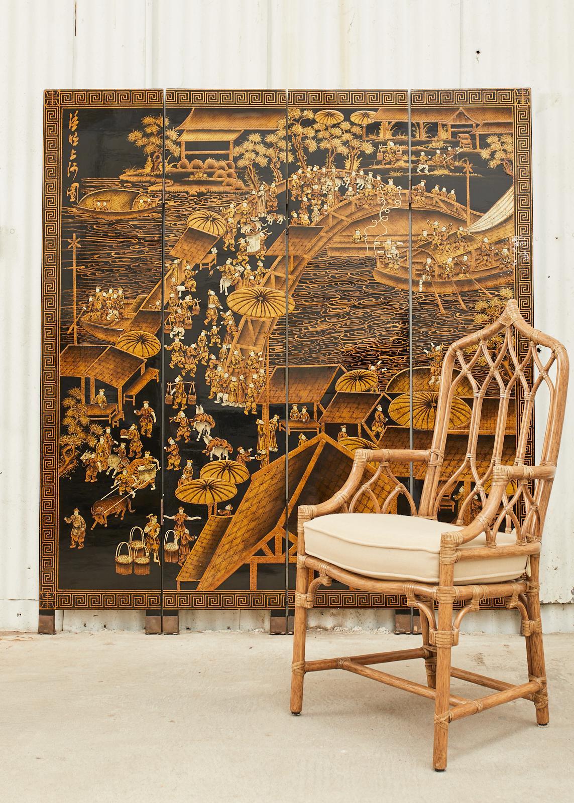 Fantastic Chinese export four-panel coromandel screen depicting the Qingming festival with a river bridge landscape. Beautifully crafted in gilt with a moriage (raised pigment) style. The panels measure 16 inches each and are conjoined with