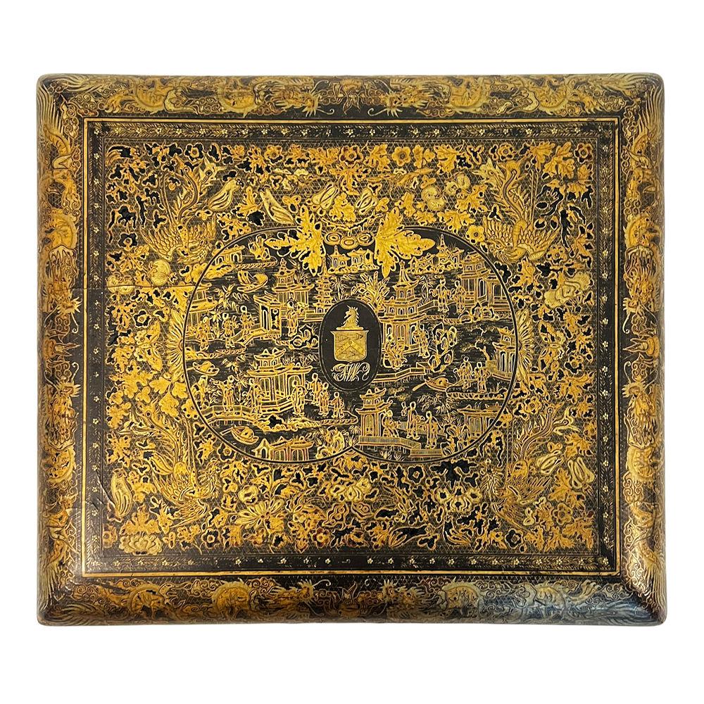 Our Chinese export games box, circa 1880s, is the finest of its kind we have come across. Includes 12 trays including eight depicting face cards, three with gilt and black lacquered landscape scenes, and one depicting a gentleman with the word