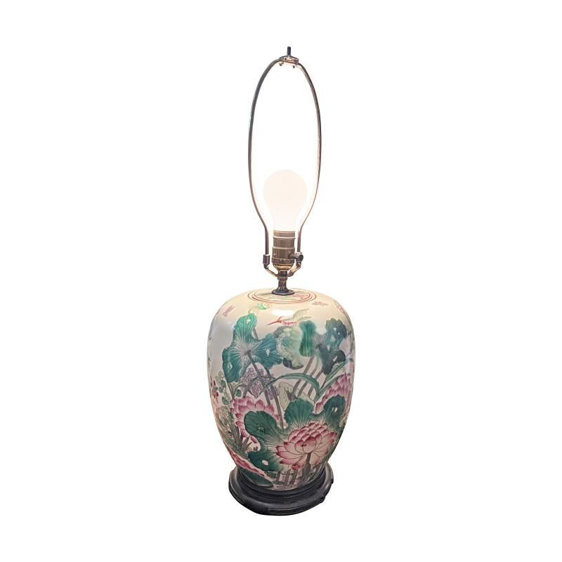 Chinese export jar lamp with lotus painted decoration.
Carved mahogany base.
Unique custom ribbon shade in green and red stripe.

Shade: Height 12.50 in / 31.75 cm, Diameter 17.00 in / 43.18 cm
Shade not included, please send message to purchase it