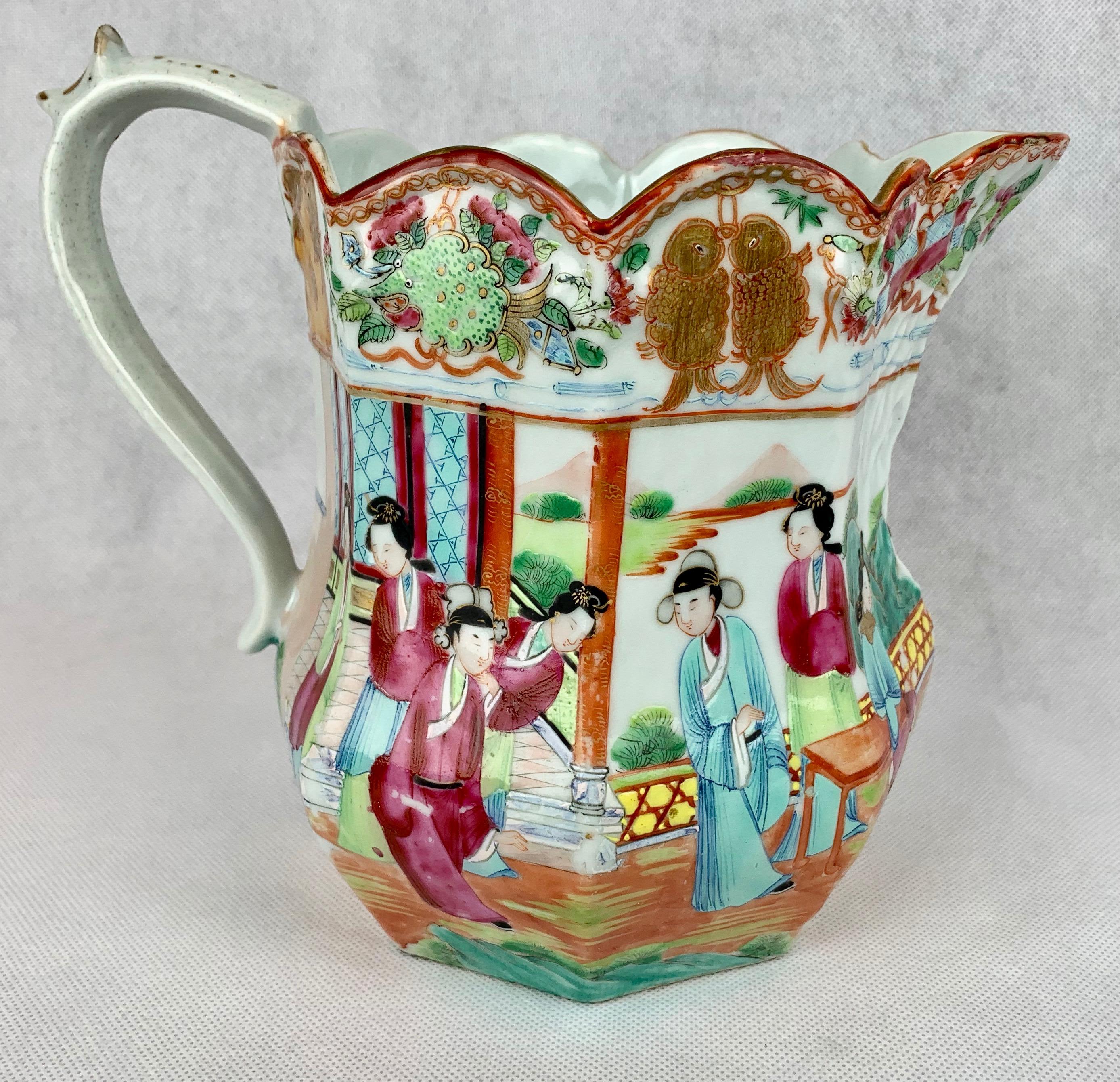 Large Chinese export porcelain pitcher in the mandarin or famille rose pattern. The octagon shaped body is decorated with court scenes and figures. The top is scalloped.
The height is 8.5