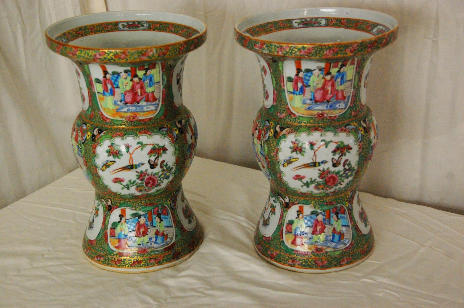 These Chinese Export pair of rose medallion Gu vases are superb examples of the form and exemplify the best of rose medallion hand painting. At this time in the mid 19th century the palette that was being used by the artists was clear and bright,