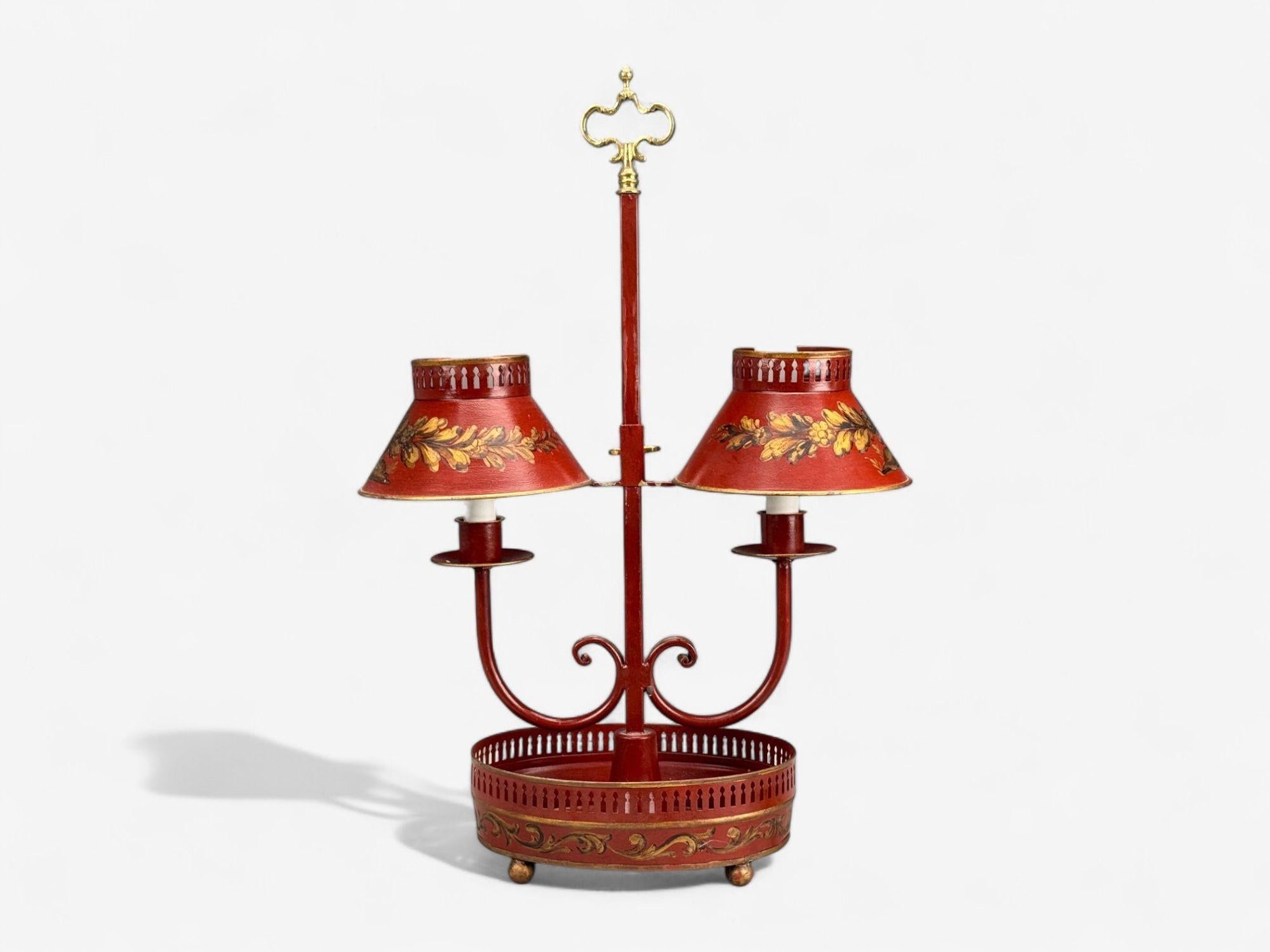 Chinese Export, Painted Metal, Brass, Chinoiserie Double Light Table Lamp, 20th C.

A double light red and gold painted metal Chinoiserie style table or desk lamp.

Painted Metal, Brass; China, 1970s

Sold with lampshades.

Bulb specification: Two E