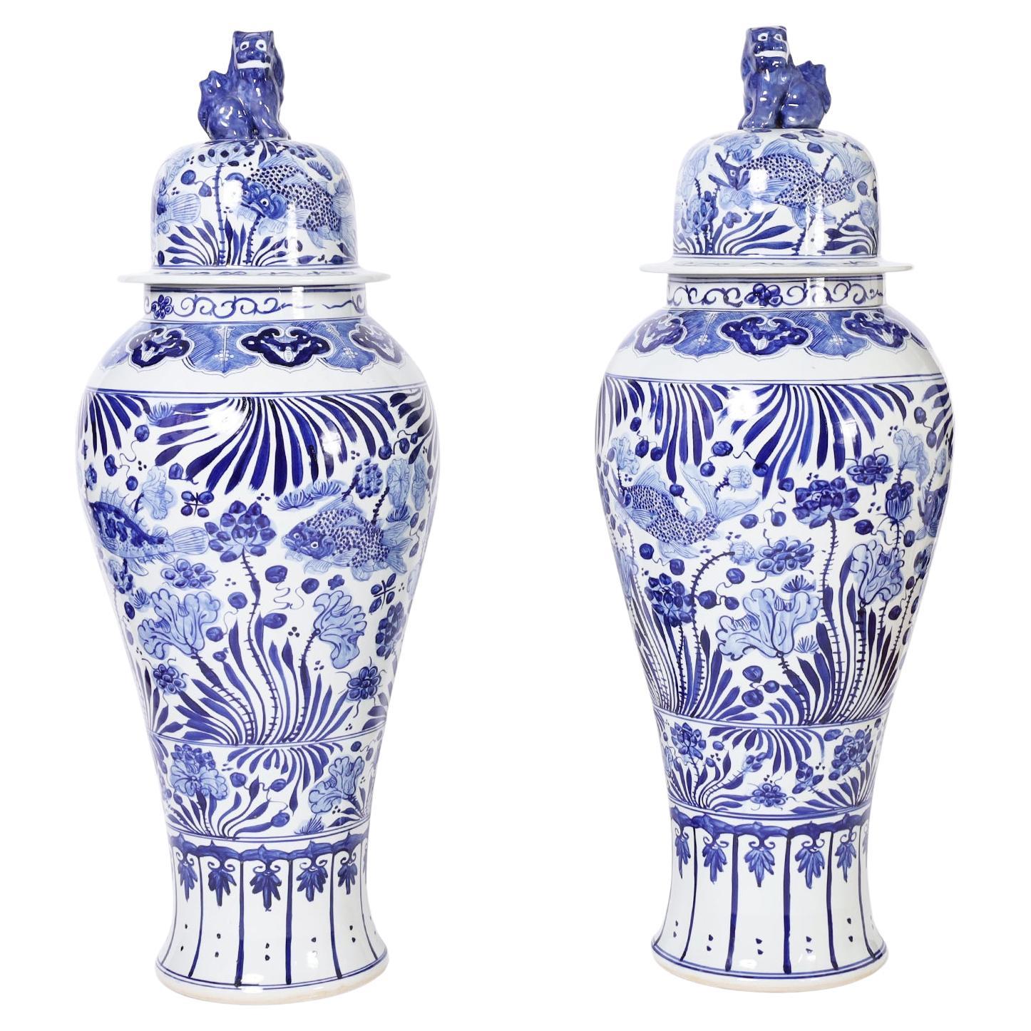 Chinese Export Pair of Chinese Blue and White Porcelain Palace Urns For Sale