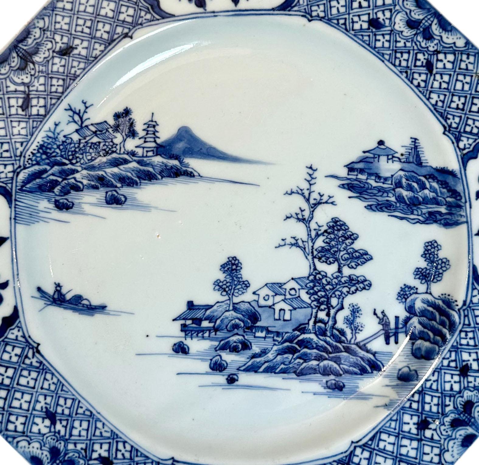 A 1790s blue and white Chinese export plate depicting three islands with a dark border. 