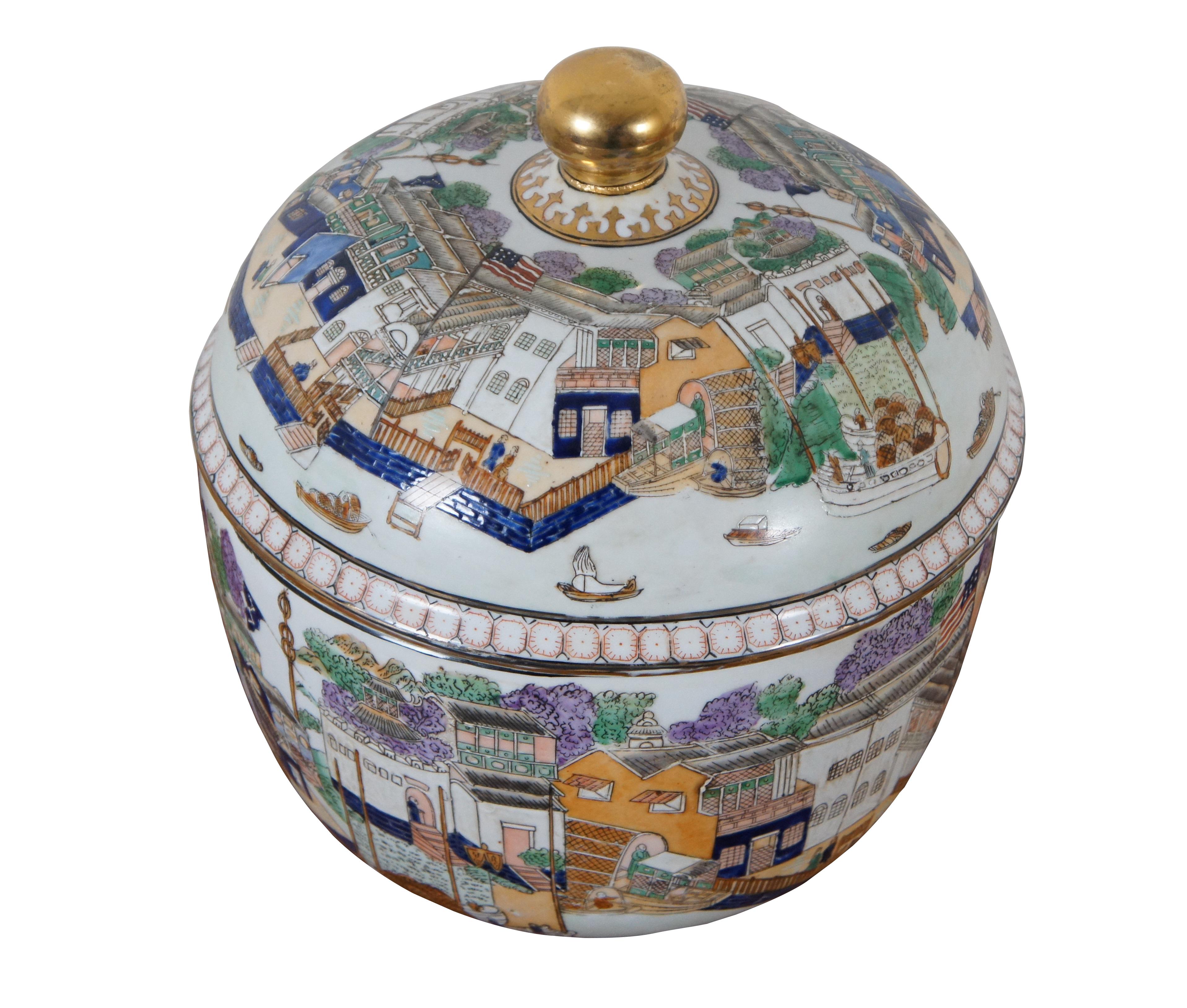 Late 20th century Chinese export moriage style polychrome porcelain lidded urn / jar / centerpiece bowl featuring a panoramic cityscape view along the Pearl River at Guangzhou.  The Hongs—the office, warehouse, and living spaces for foreign