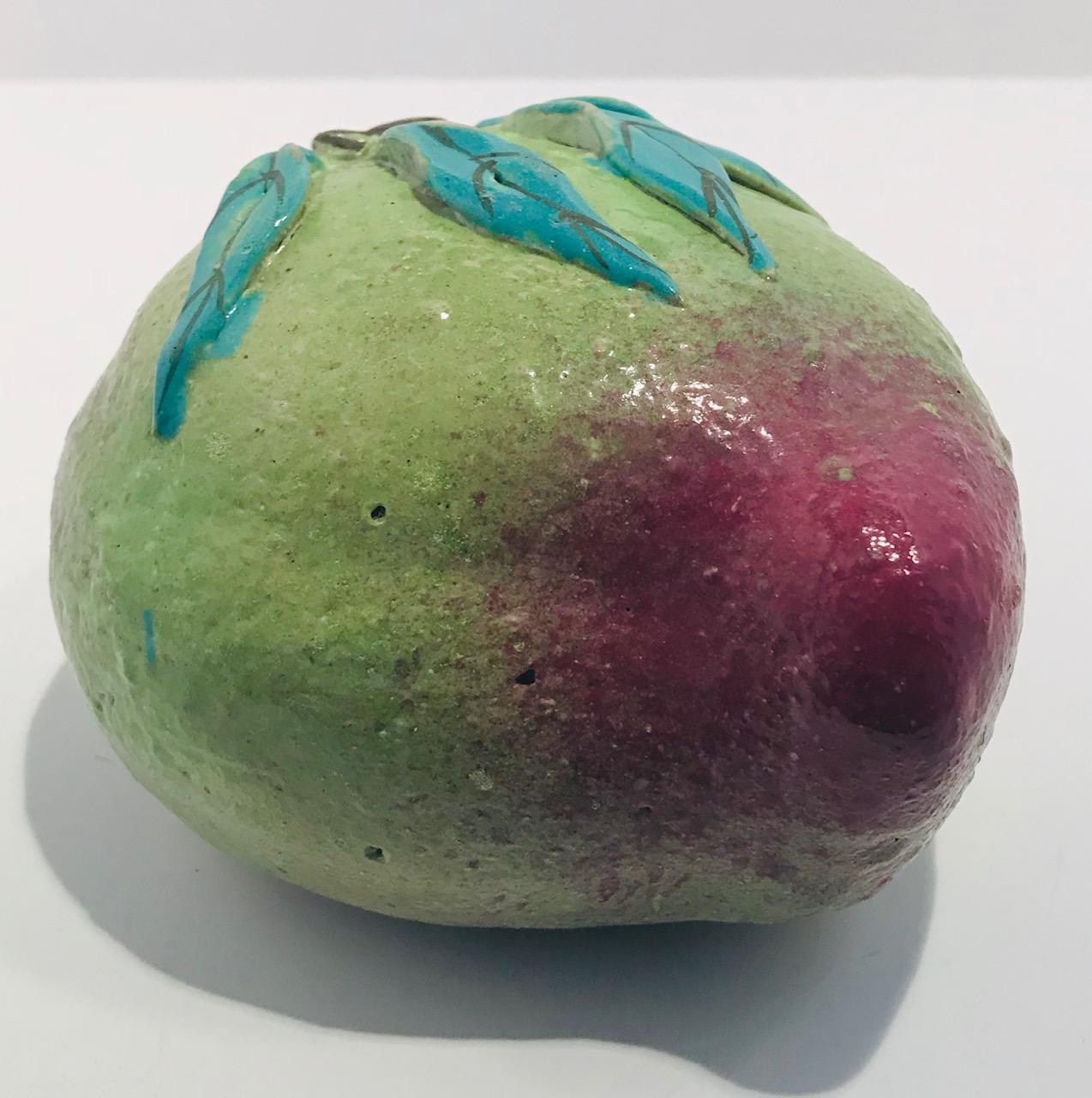 Chinese export porcelain hand decorated altar fruit in the form of a peach. These were left at temples as offerings.

(This item is eligible for a gift box)