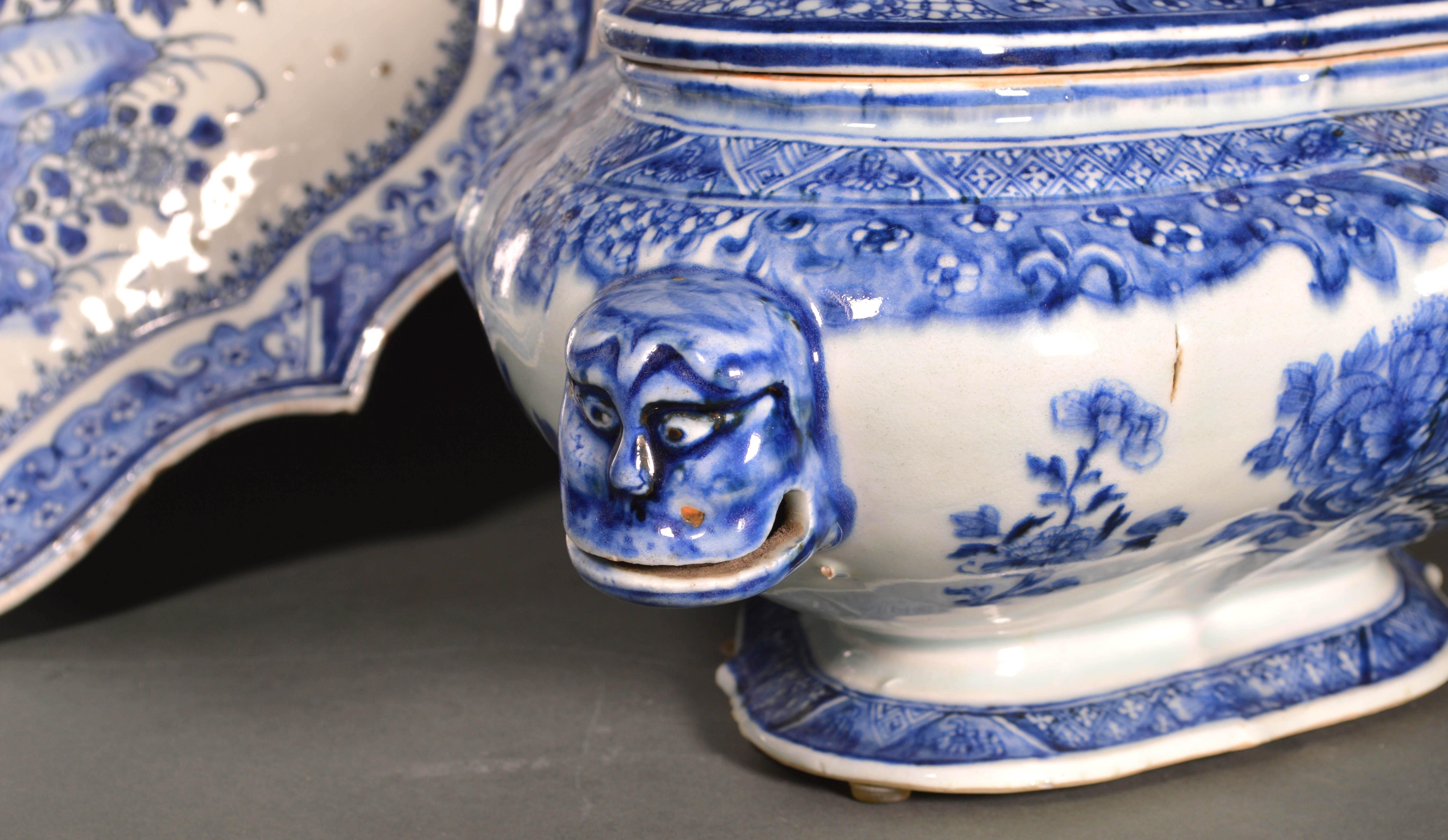 Chinese Export porcelain early blue and white soup tureen, cover and stand,
circa 1740-1750 
   
The rare Chinese Export porcelain tureen is of a quatrefoil bombé shape and is painted on both sides with an Oriental garden with plants and flowers