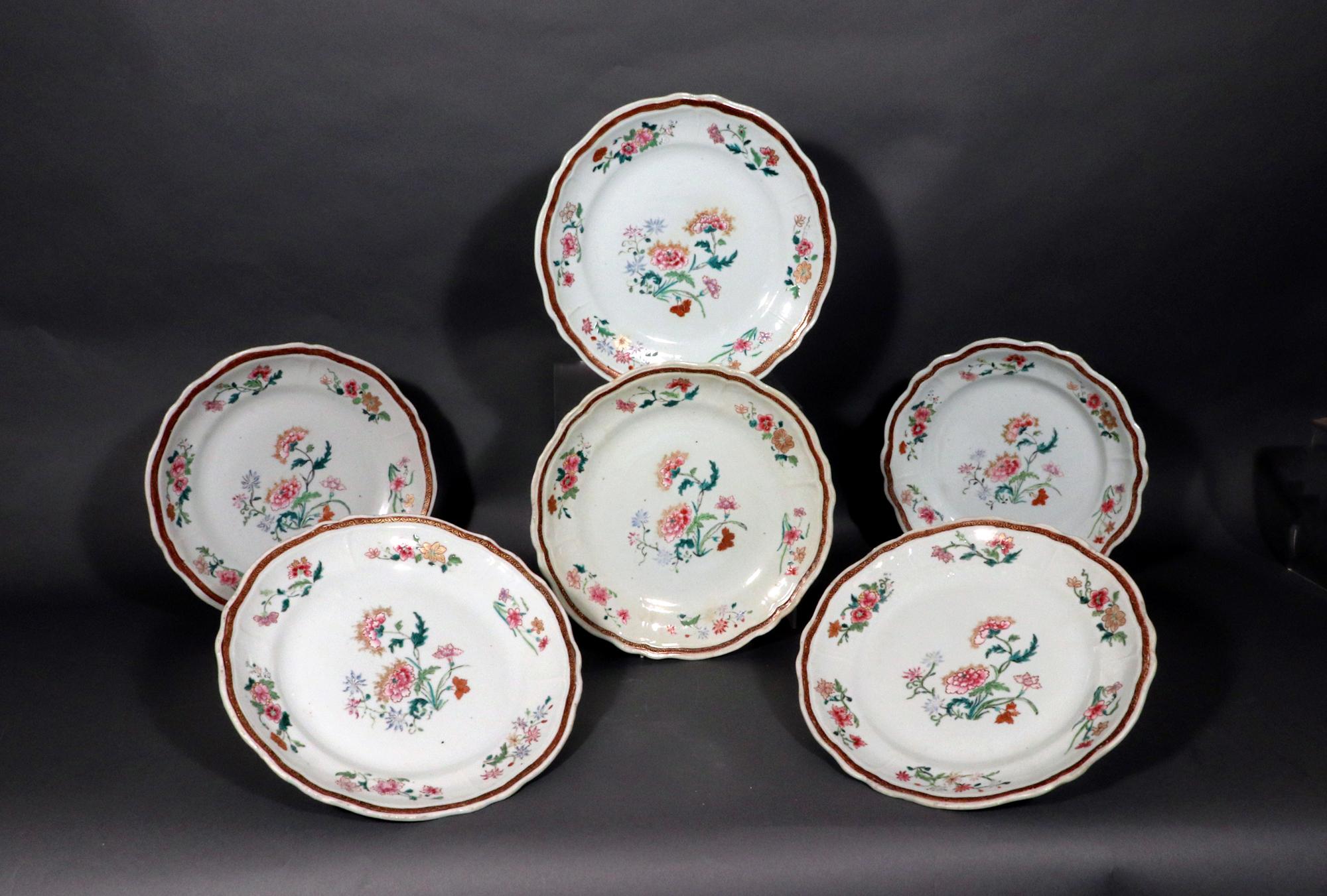 Chinese Export Porcelain Famille Rose Botanical Large Plates,
Set of Six Large Plates or Dishes,
Circa 1760

The Chinese Export famille rose plates are molded in the form of a European silver shape with an undulating rim.  The central well is