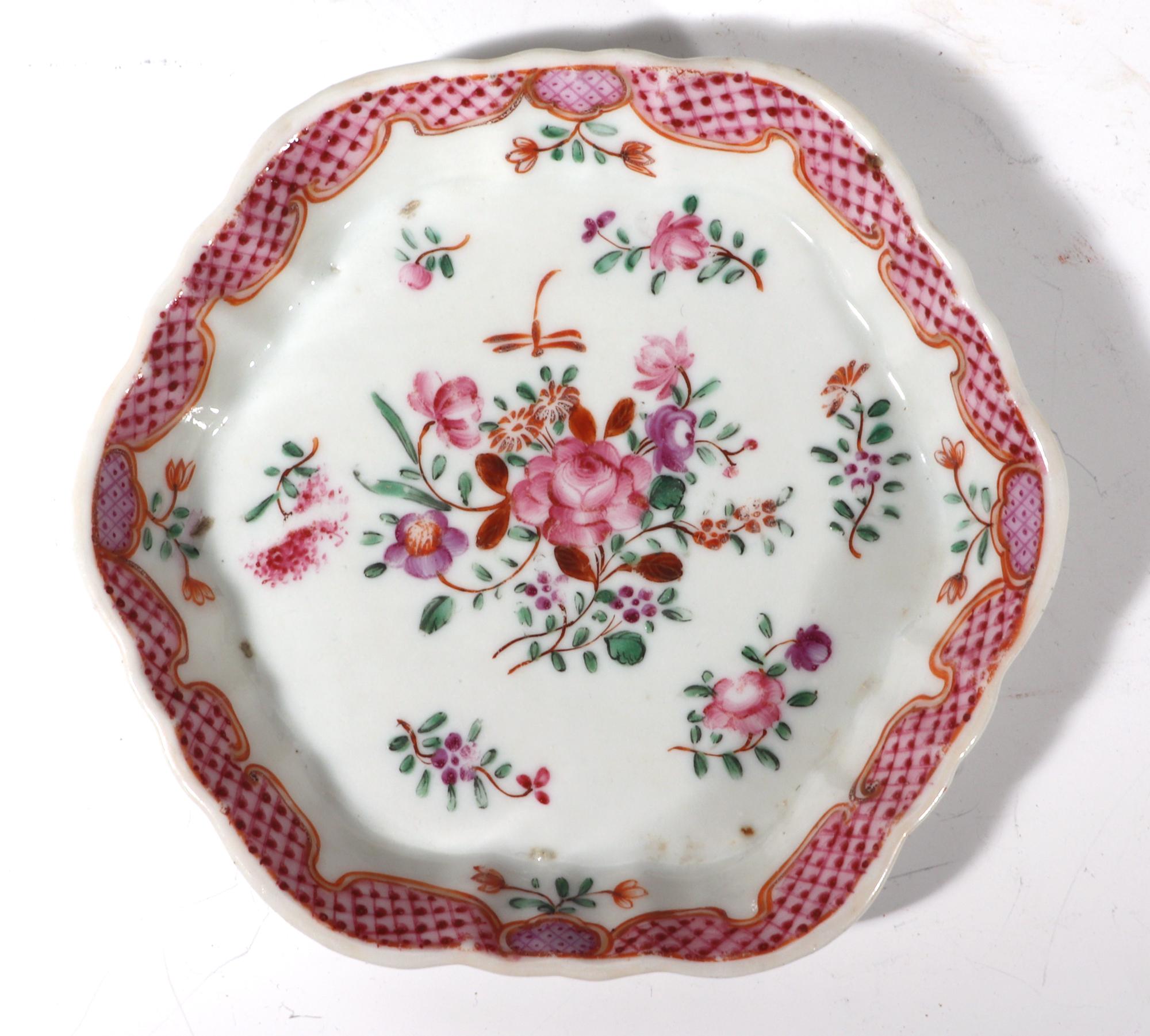 Chinese Export Porcelain Famille Rose Botanical teapot stand,
circa 1775

The Chinese Export porcelain famille rose hexagonal teapot stand is centered with a grouping of flowers and leaves with small flowering stems around the edge of the center