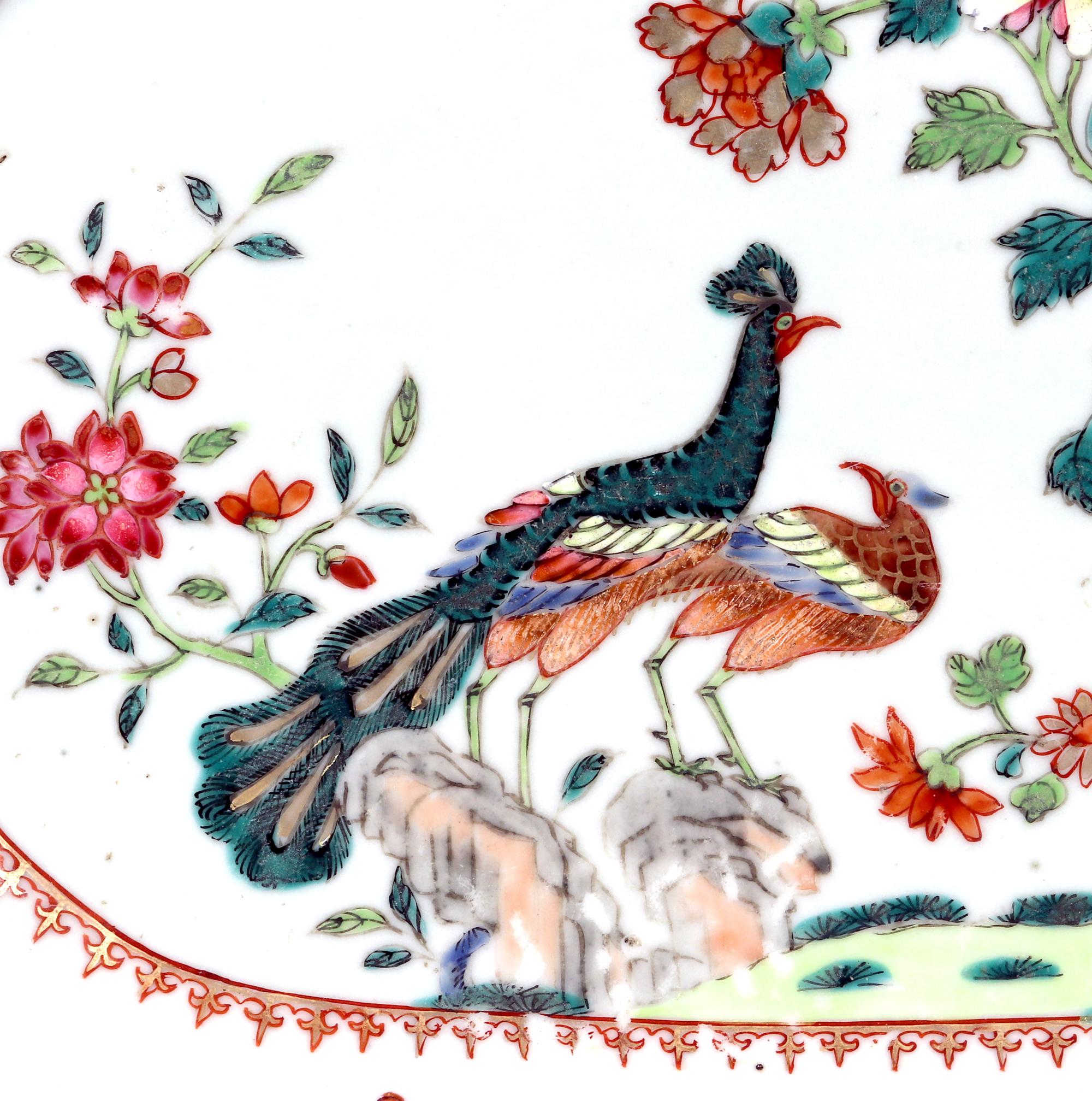Chinese Export porcelain double peacock dish,
Circa 1765

The Chinese Export porcelain famille rose rectangular dish with canted corners is painted with the famous 