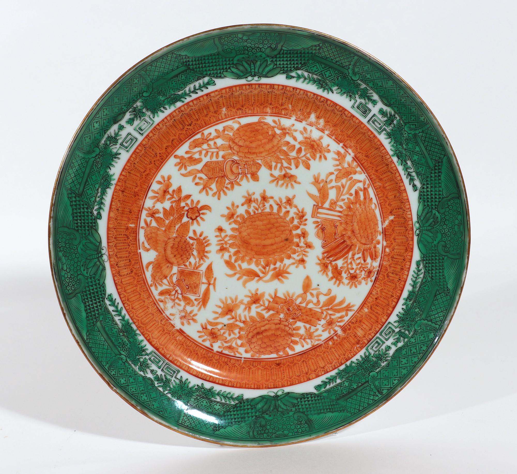 Chinese Export Porcelain Green & Orange Fitzhugh Plates,
Set of Six,
Circa 1800

The Chinese Export porcelain plates are painted with an unusual and rare combination of an orange center and a green border in a pattern known as Fitzhugh. It is also