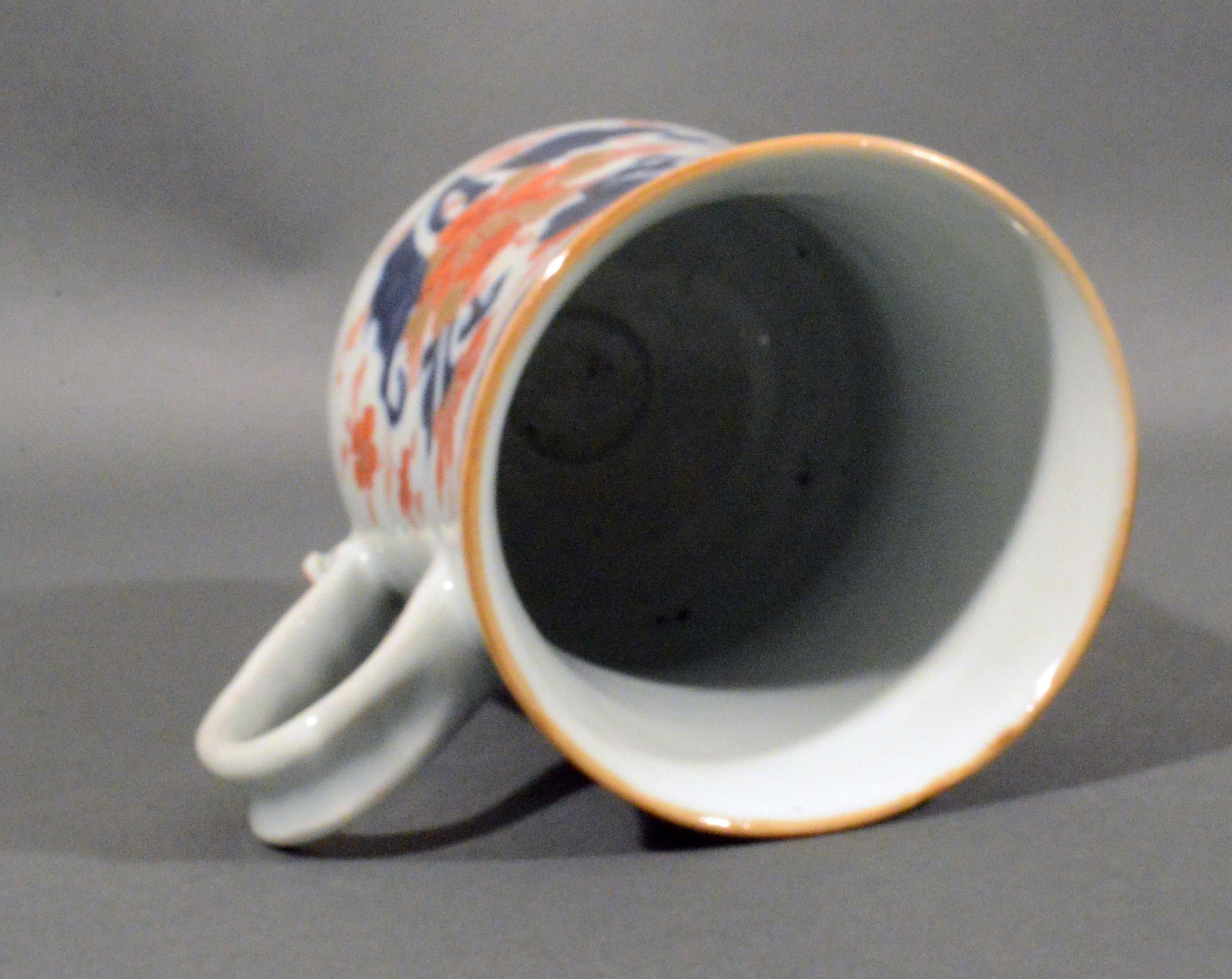 Chinese export porcelain Imari bell-shaped large tankard,
circa 1740
(Ref: NY9245-imr)

The bell-form Chinese Export Imari porcelain tankard is painted in underglaze 