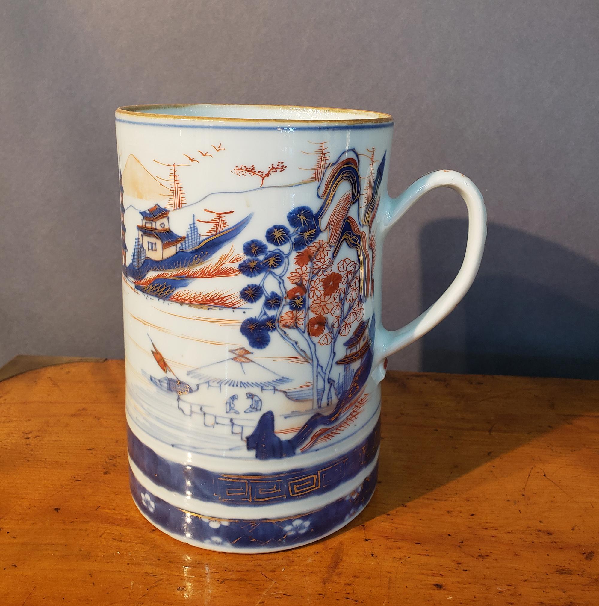 Chinese Export Porcelain Imari Tankard,
Circa 1740

The Chinese Export porcelain tankard depicts a small male figure standing in the foreground dwarfed before rising mountains. A pagoda can be seen in the background. On the other side as part of