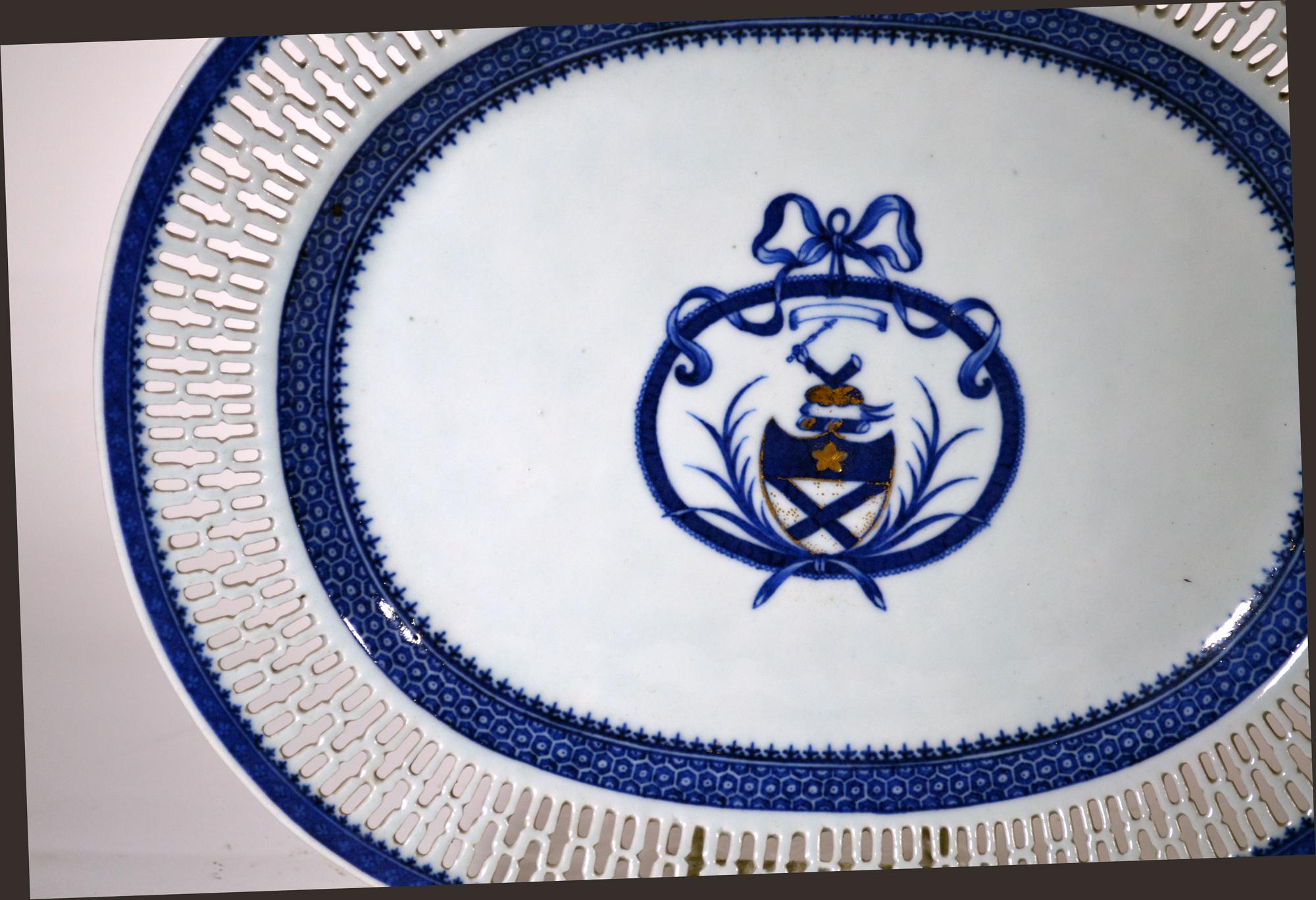 Chinese Export Porcelain large armorial blue & white openwork dishes,
Arms of Bruce,
Circa 1790

The large Chinese Export oval porcelain armorial dishes have a central armorial device in the center with gilt highlights. The border with spearhead