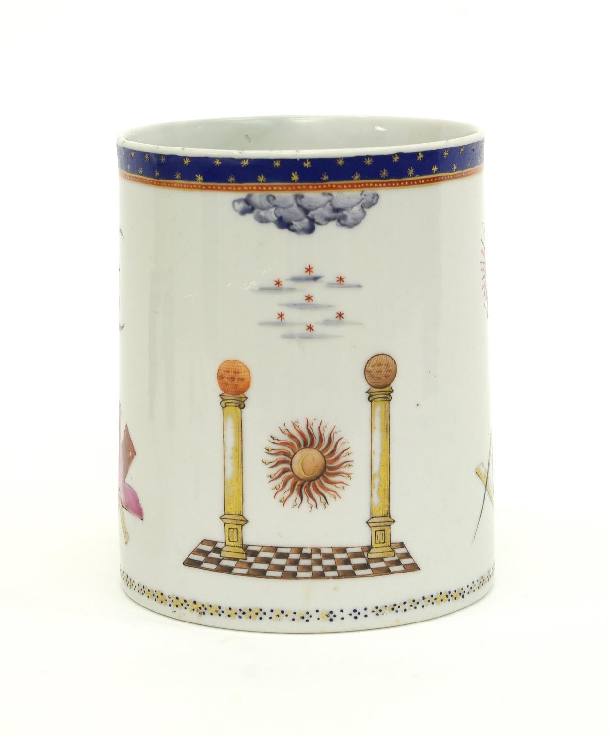 Chinese export porcelain Masonic cider mug, the cylindrical body with a double strap handle, decorated overall with Masonic emblems beneath a blue enamel band with gilt stars. Bears an S. Marchant & Son label to the bottom.

Restored chip to the