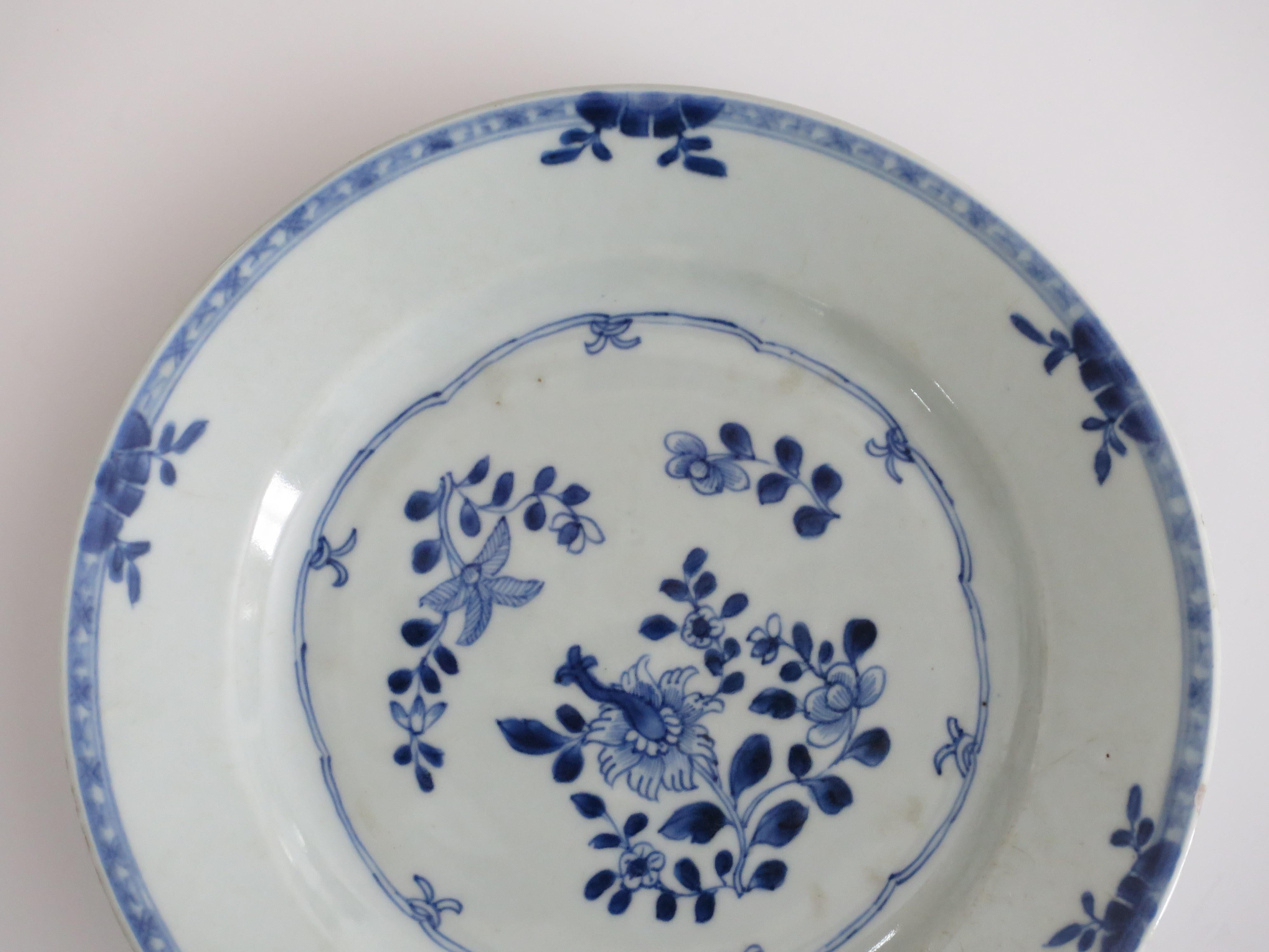 This is a hand painted blue and white Chinese porcelain plate, dating to the second half of the 18th century, circa 1770, Qing dynasty.

The plate is well potted, and has been hand decorated in a free flowing manner in varying shades of cobalt