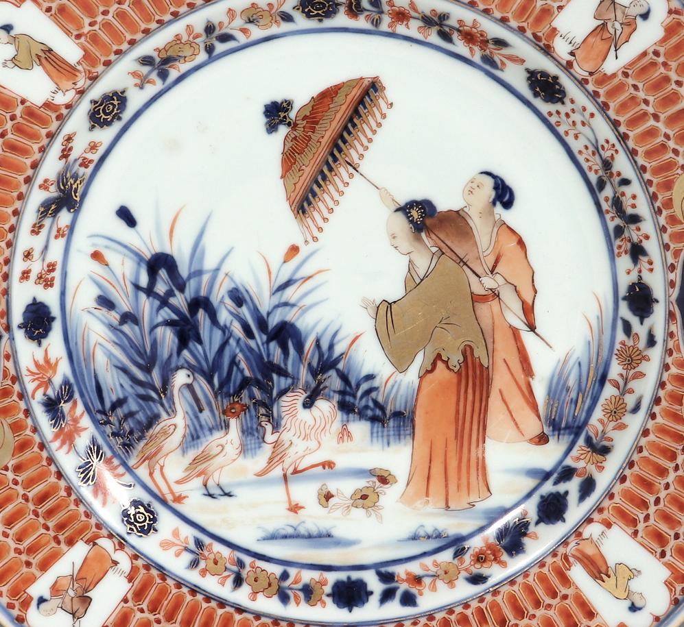 Chinese export porcelain pronk La Dame au Parasol Plate
circa 1740

The Chinese Export porcelain plate is painted after a design by Cornelis Pronk, depicting an Oriental lady and her parasol-bearing attendant watching three colorful waterbirds in