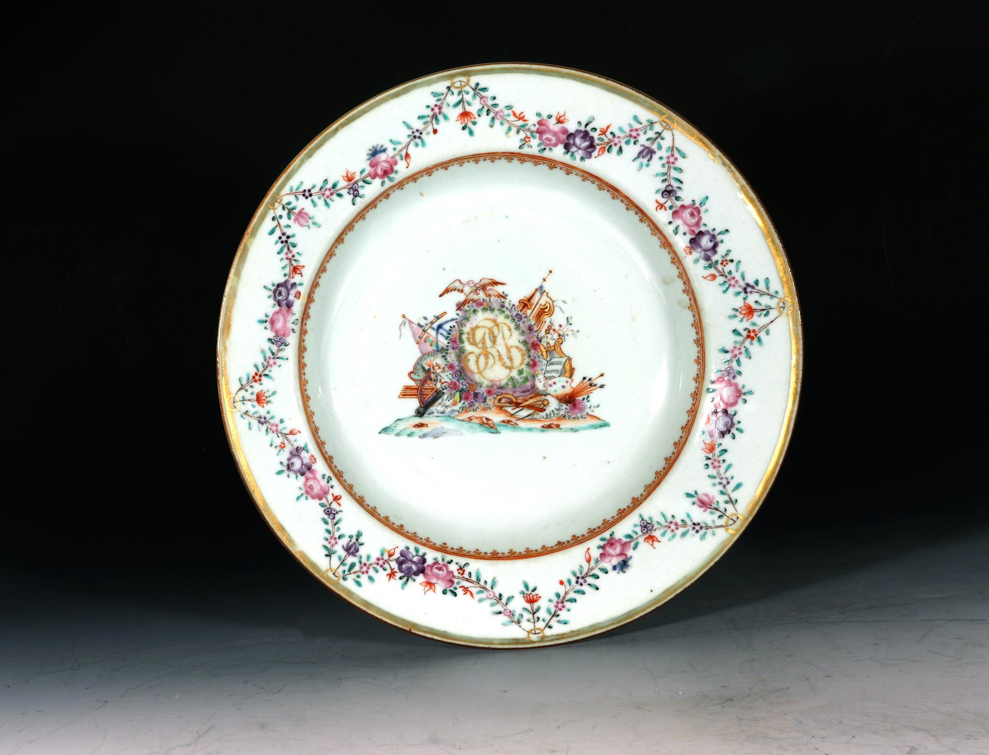 Chinese Export porcelain armorial crested soup plate,
circa 1765

The Chinese Export porcelain armorial plate has a flower festoon border at the rim and a spearhead inner border at the top of the bowl. The center has an unusual large armorial