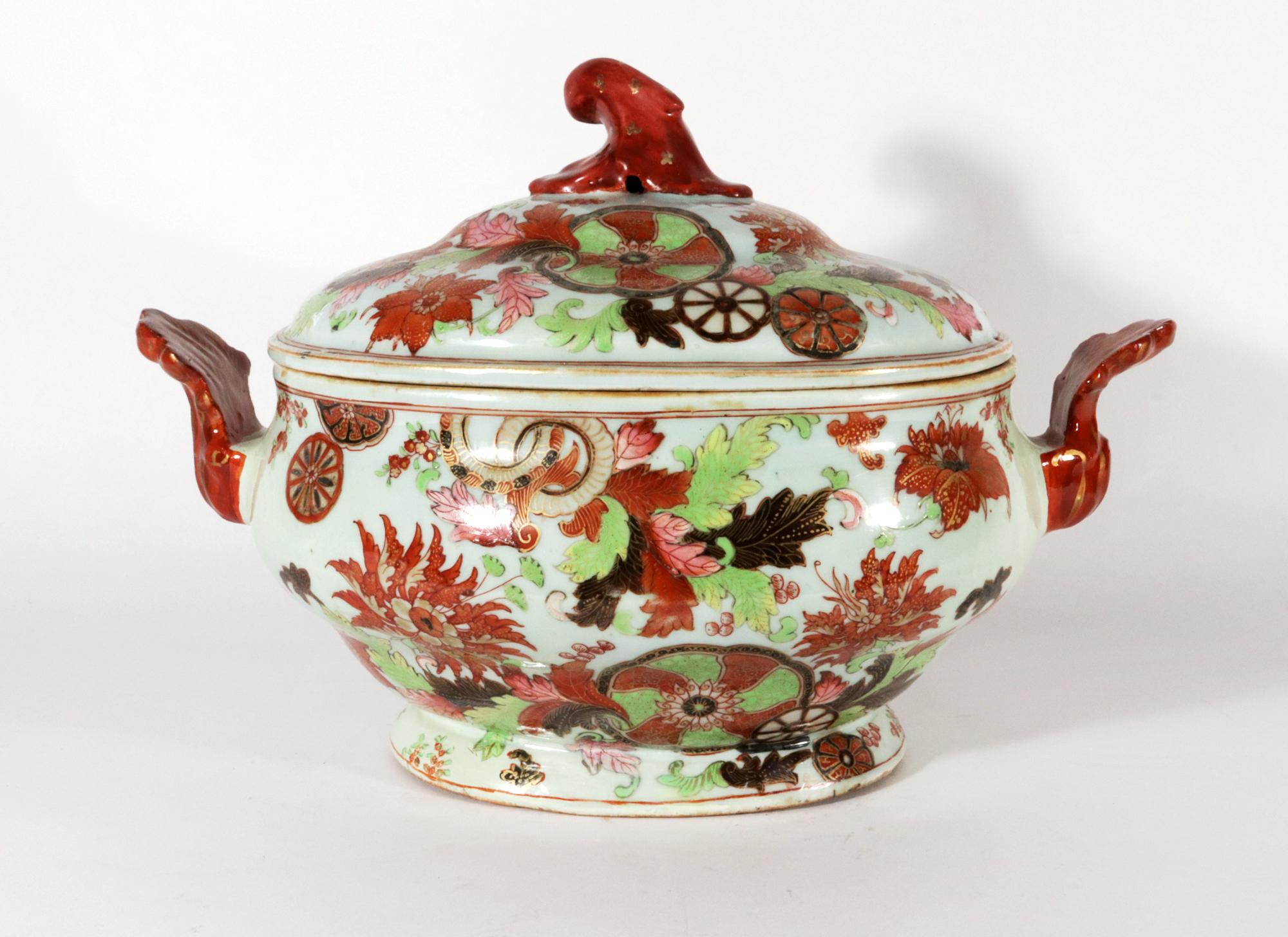 Chinese Export Porcelain Pseudo Tobacco Leaf Soup Tureen and Cover,
Circa 1765

The Chinese Export porcelain bombe-form tureen with domed cover is painted in a variation of the tobacco leaf pattern.  This is one of the most interesting variations