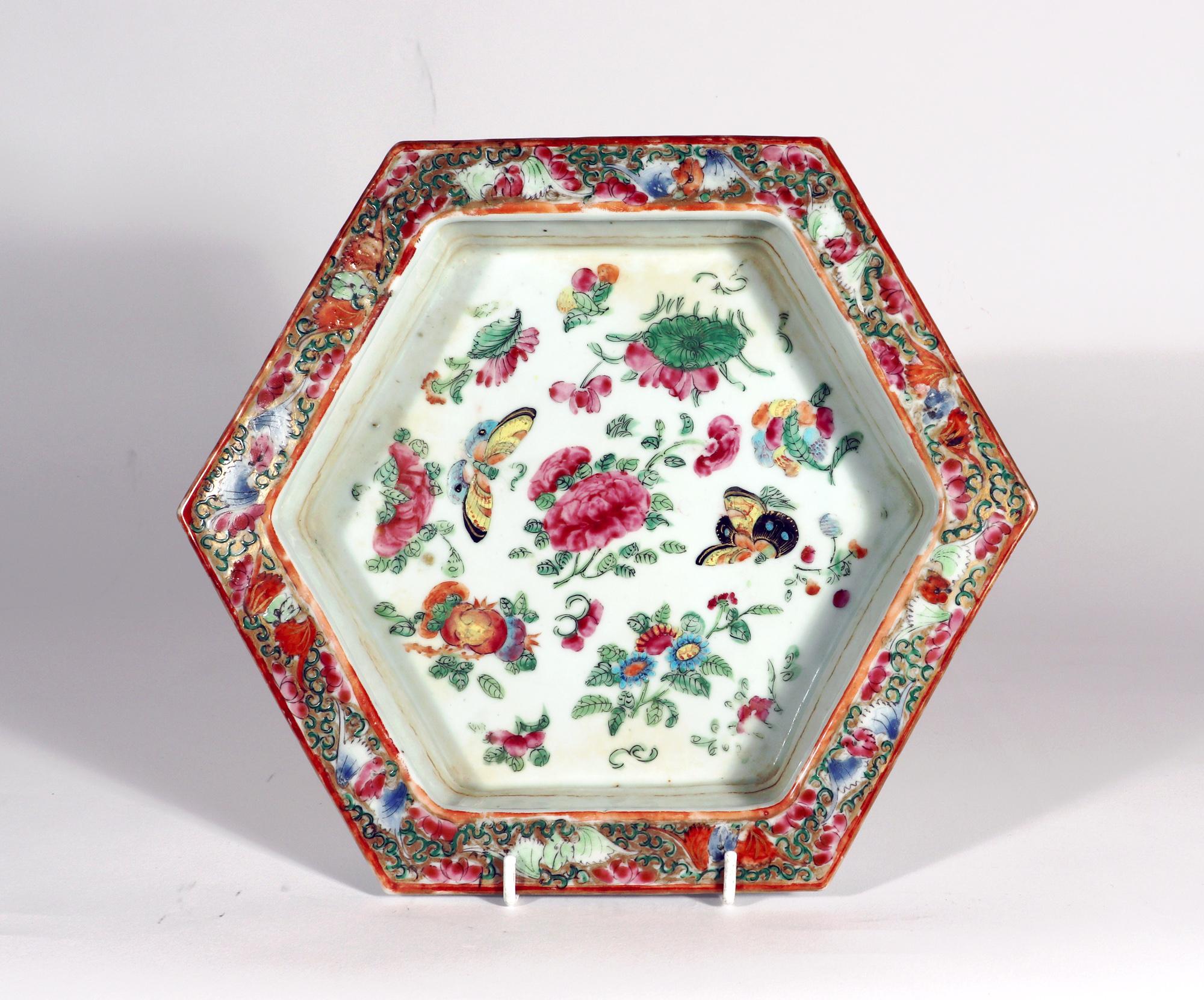 Chinese Export Porcelain Rose Canton Cache Pot & Stand,
1820-1840

The large hexagonal-shaped Chinese Export porcelain cache pot has six panels with different scenes from Chinese mythology, the base of each arched. There is a continuous band of