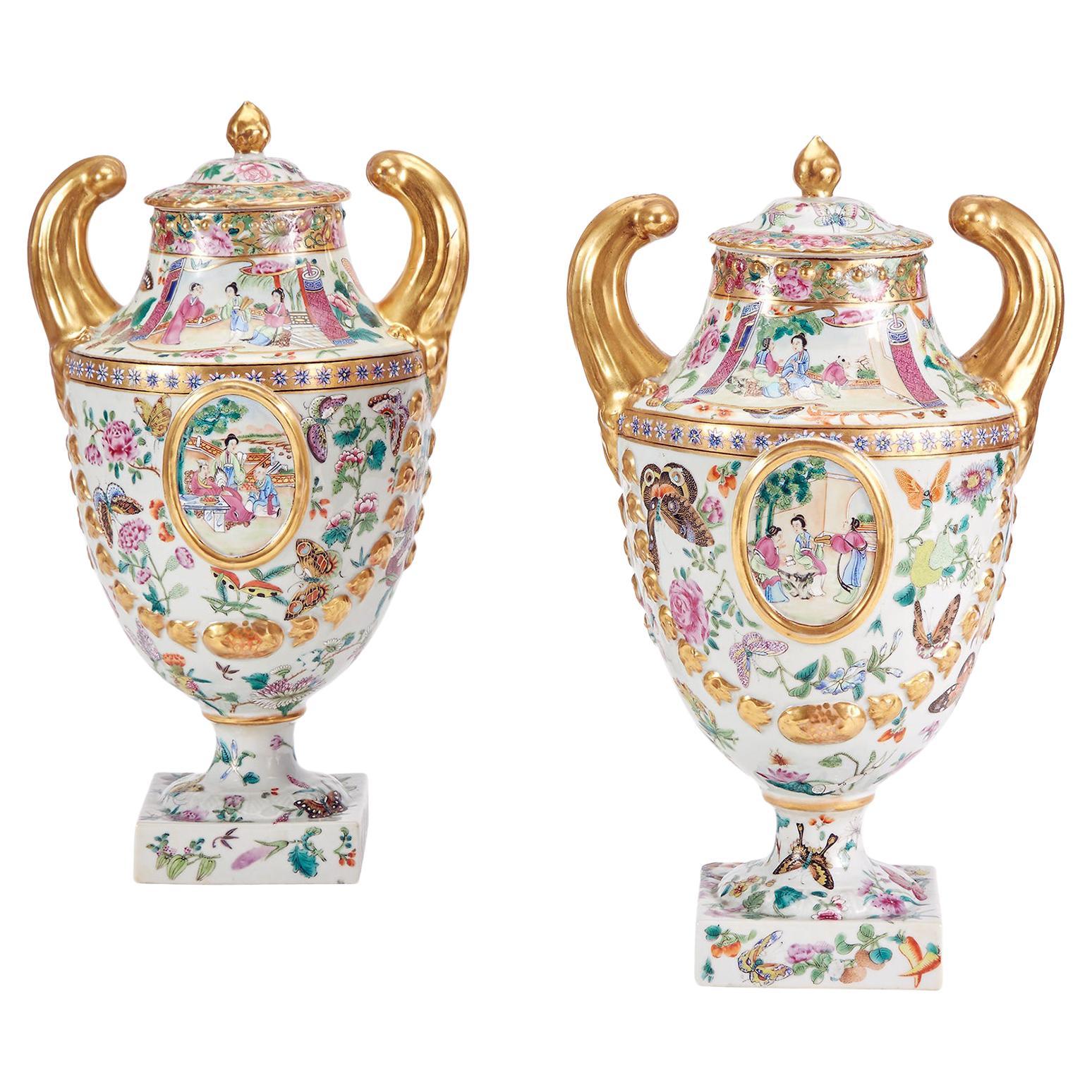 Chinese Export Porcelain Rose Mandarin Pistol-Handled Urns and Covers