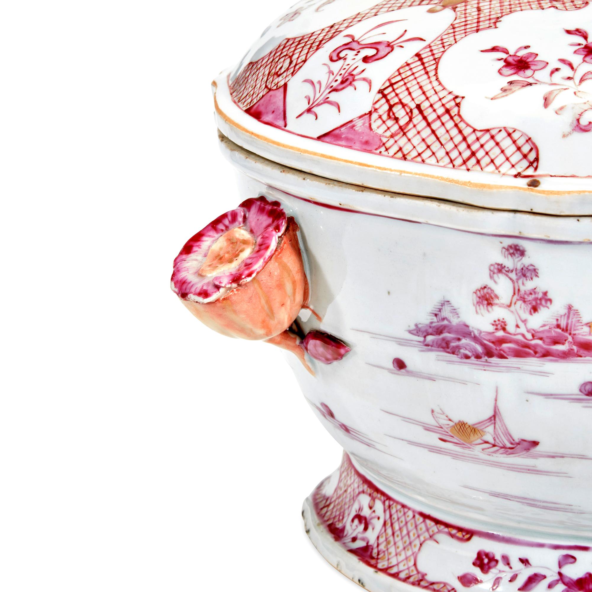 The Chinese Export porcelain puce colored oval-shaped soup tureen is decorated with pavilions by a river, the wide diaper borders punctuated by shaped reserves of lotus and lingzhi sprays, an unusual large Flower head finial to the domed cover. The