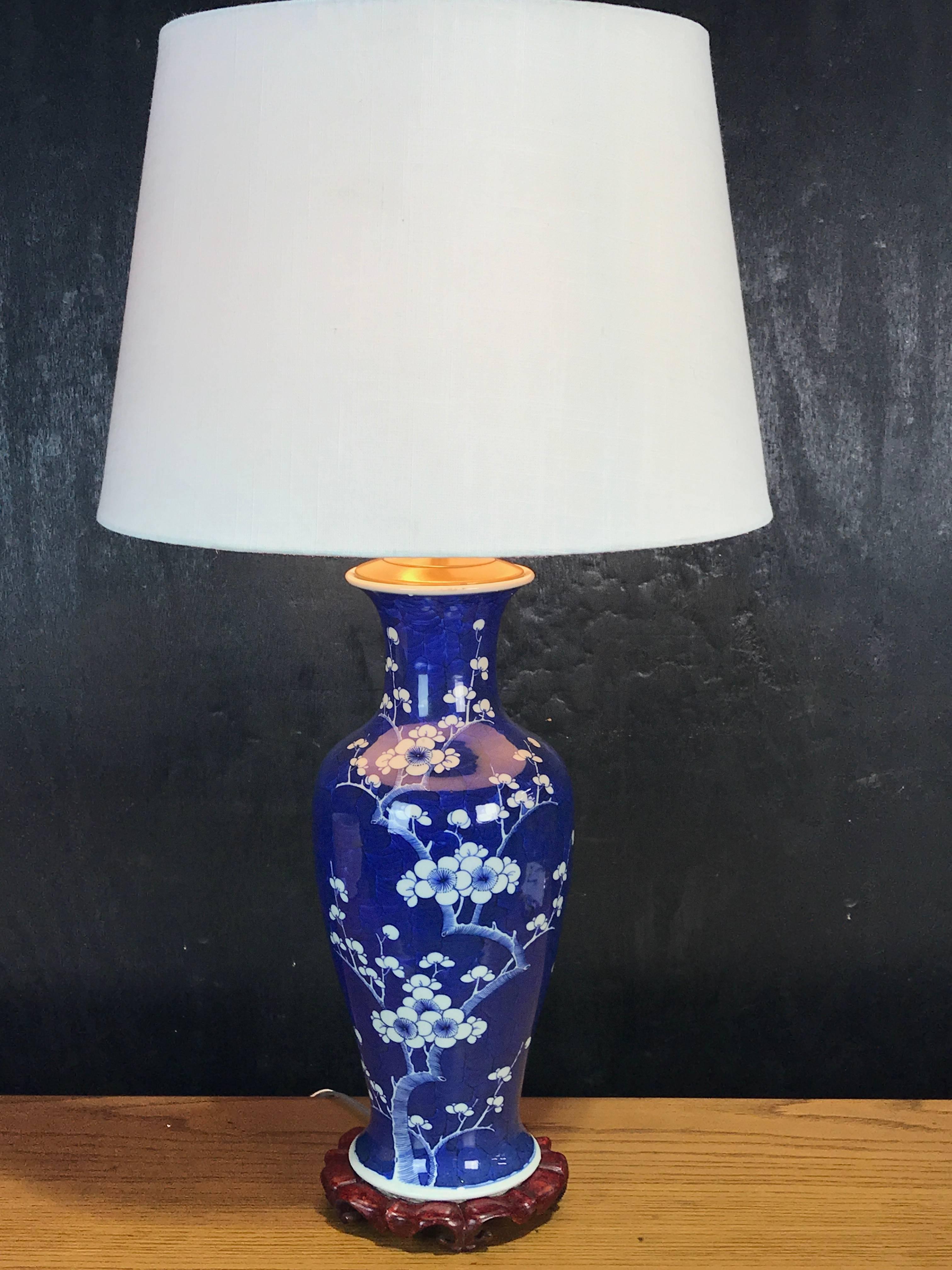 Chinese Export Prunus Vase, Now as a Lamp
Early 20th Century, China
Dimensions: Height: 24 in Diameter: 7 in

Bring home this beautifully crafted Chinese Export prunus vase, which has been thoughtfully reimagined as a lamp. Standing at a good size