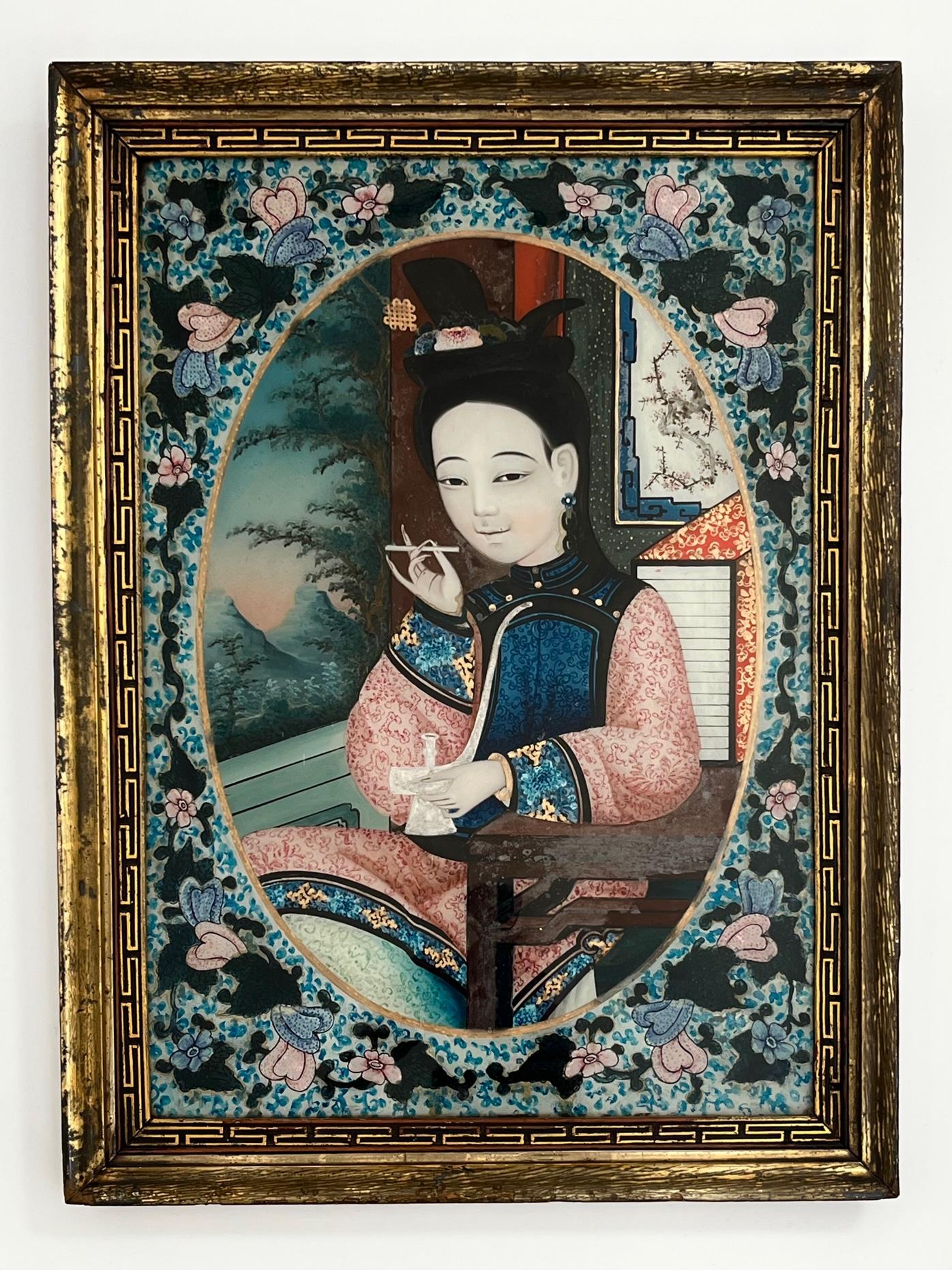 A wonderful and extremely rare last quarter 19th century Chinese export for the Anglo-Indian market reverse glass portrait painting of an opium-smoking maiden or young lady painted in oval and sat in an interior with a 'stem' in her upraised right