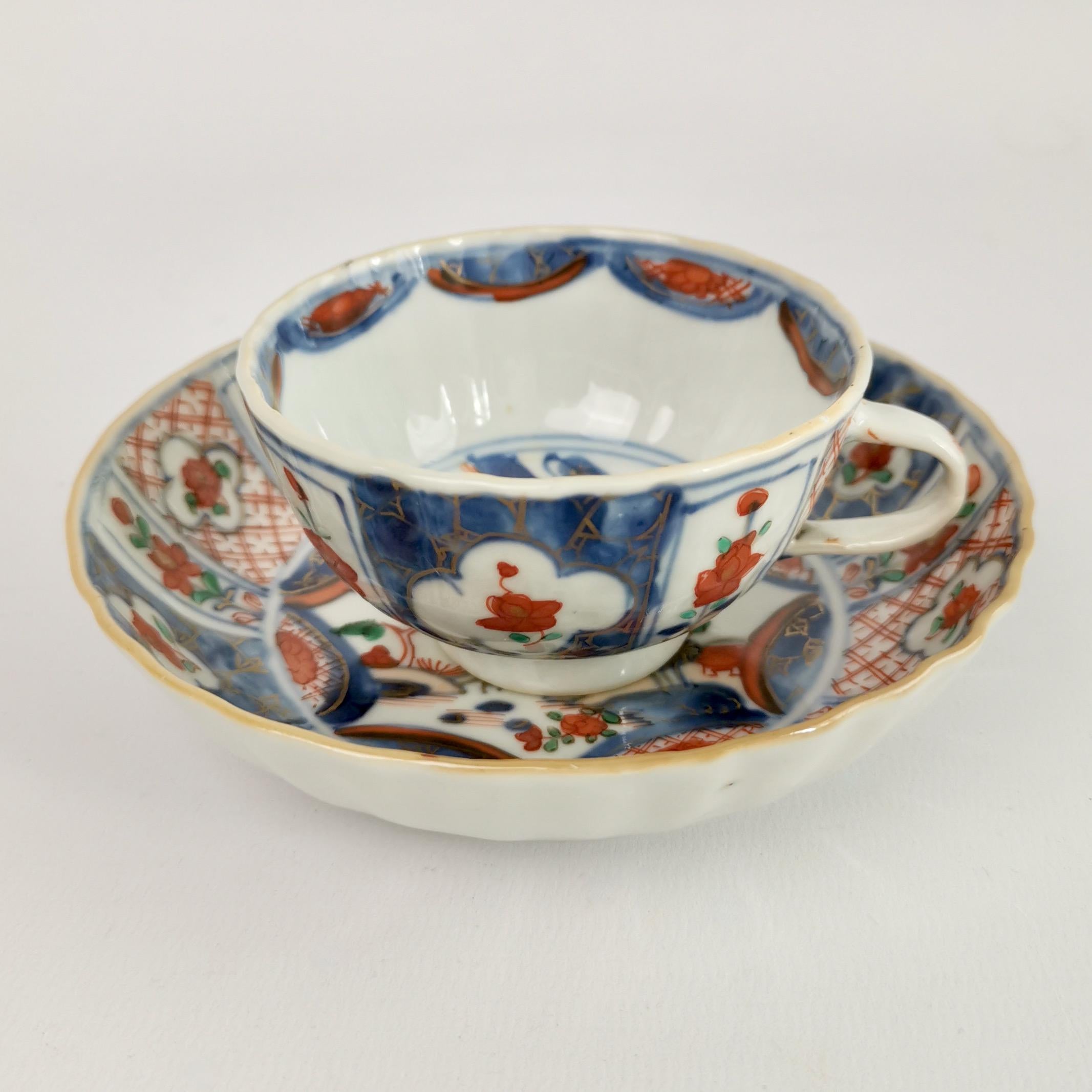 This is a beautiful set of six tea bowls and saucers made in China for export to the West in the Qianlong period in the 18th Century. The set was decorated in the Imari style.

The set is potted in fine greyish porcelain with shiny glaze, in a