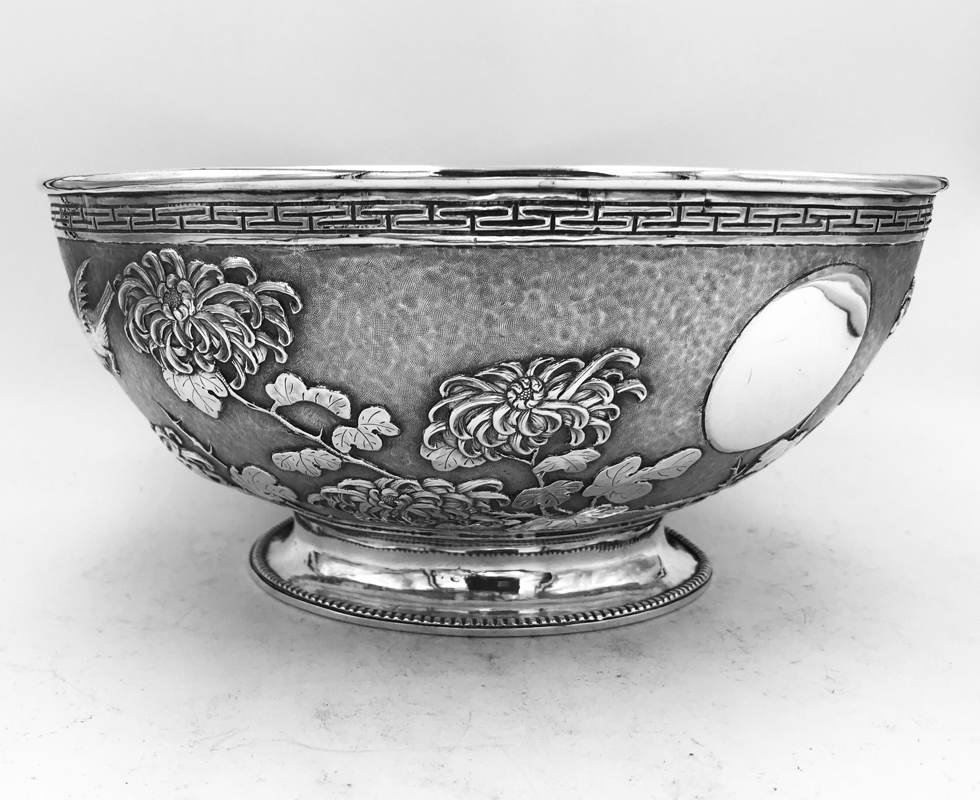 A lovely Chinese silver bowl, embossed and chased with three birds and chrysanthemum against a textured matte background. Made by the firm of Shao Ji'绍记’, and retailed by Luen Hing '联兴‘ of Shanghai, circa 1890.