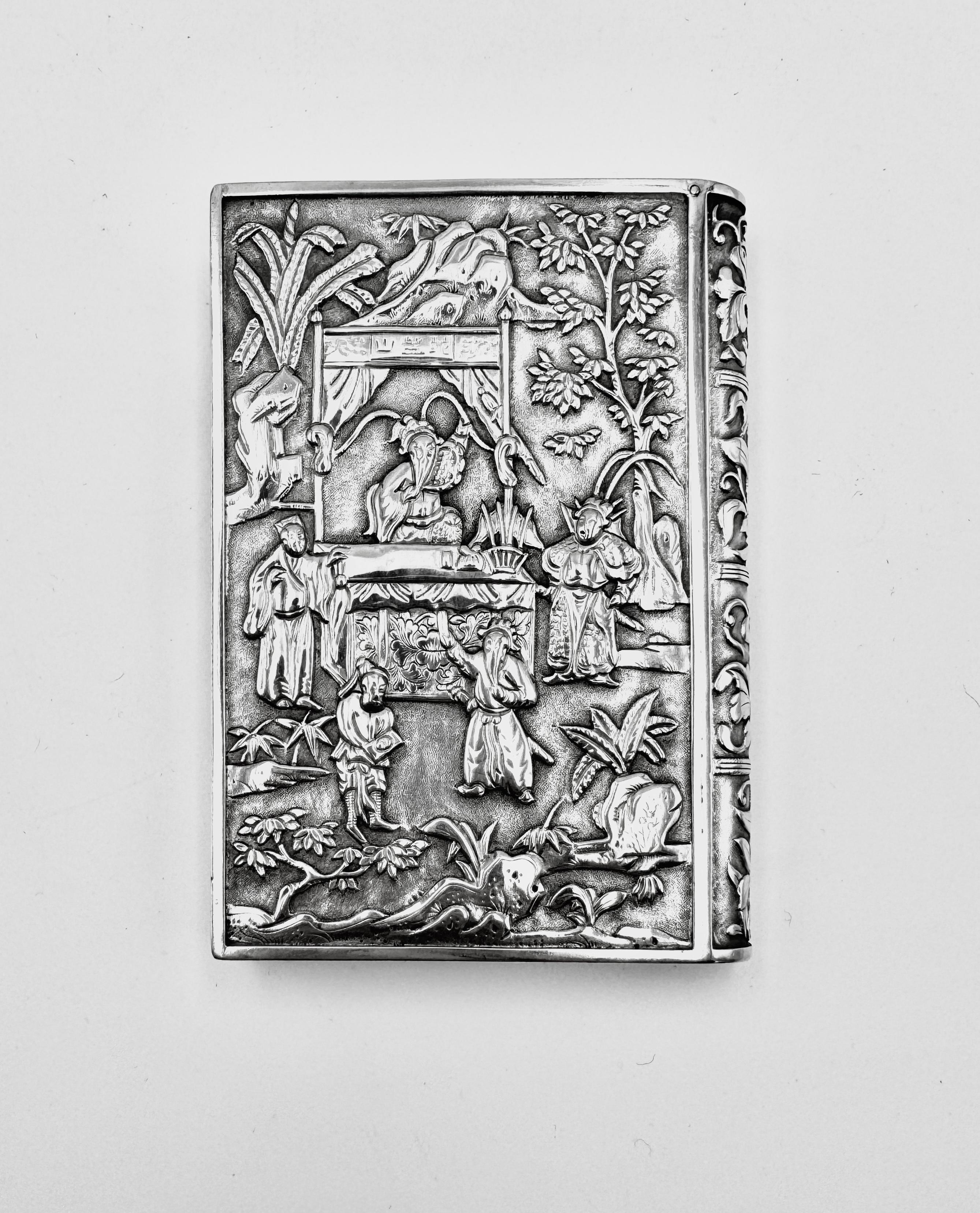 Chinese Export Silver Card Case, circa 1880, embossed and chased with a classic Peking opera scene featuring a monumental arch inscribed with “Shepanshan” (蛇盘山), a place name from Journey to the West, where Tang Sanzang’s mount—the White Dragon