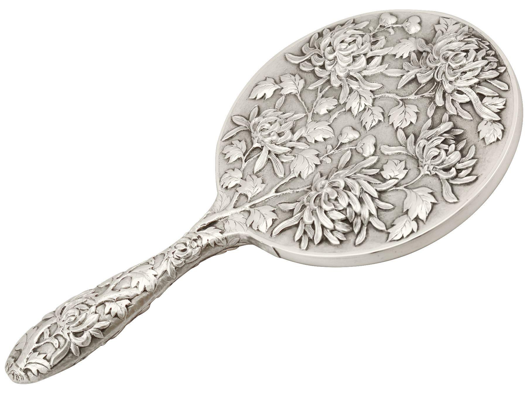 An exceptional, fine and impressive antique Chinese export silver dressing table hand mirror; an addition to our ornamental bedroom silverware collection

This exceptional antique Chinese export silver (CES) hand mirror has a circular form with a