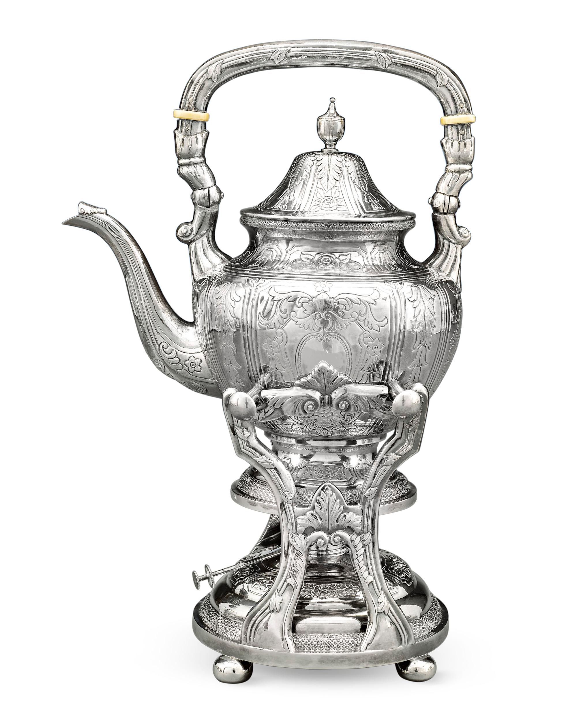This stunning and complete seven-piece Chinese export silver tea and coffee service was crafted by Yu Chang of Shanghai and Hong Kong, a firm renowned for its unique and high-quality creations. Comprising a hot water kettle and stand, tea pot,