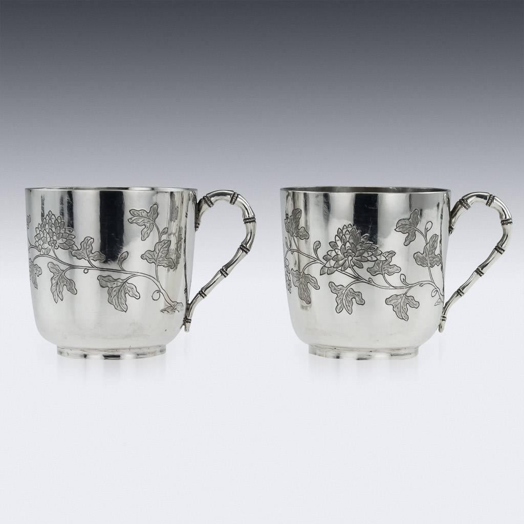 Antique 19th century Chinese solid silver pair of tea cups and saucers, the sides are engraved with chrysanthemum flowers and bamboo. The tea cups are of good traditional size and features stunning workmenship. Hallmarked with Chinese characters to