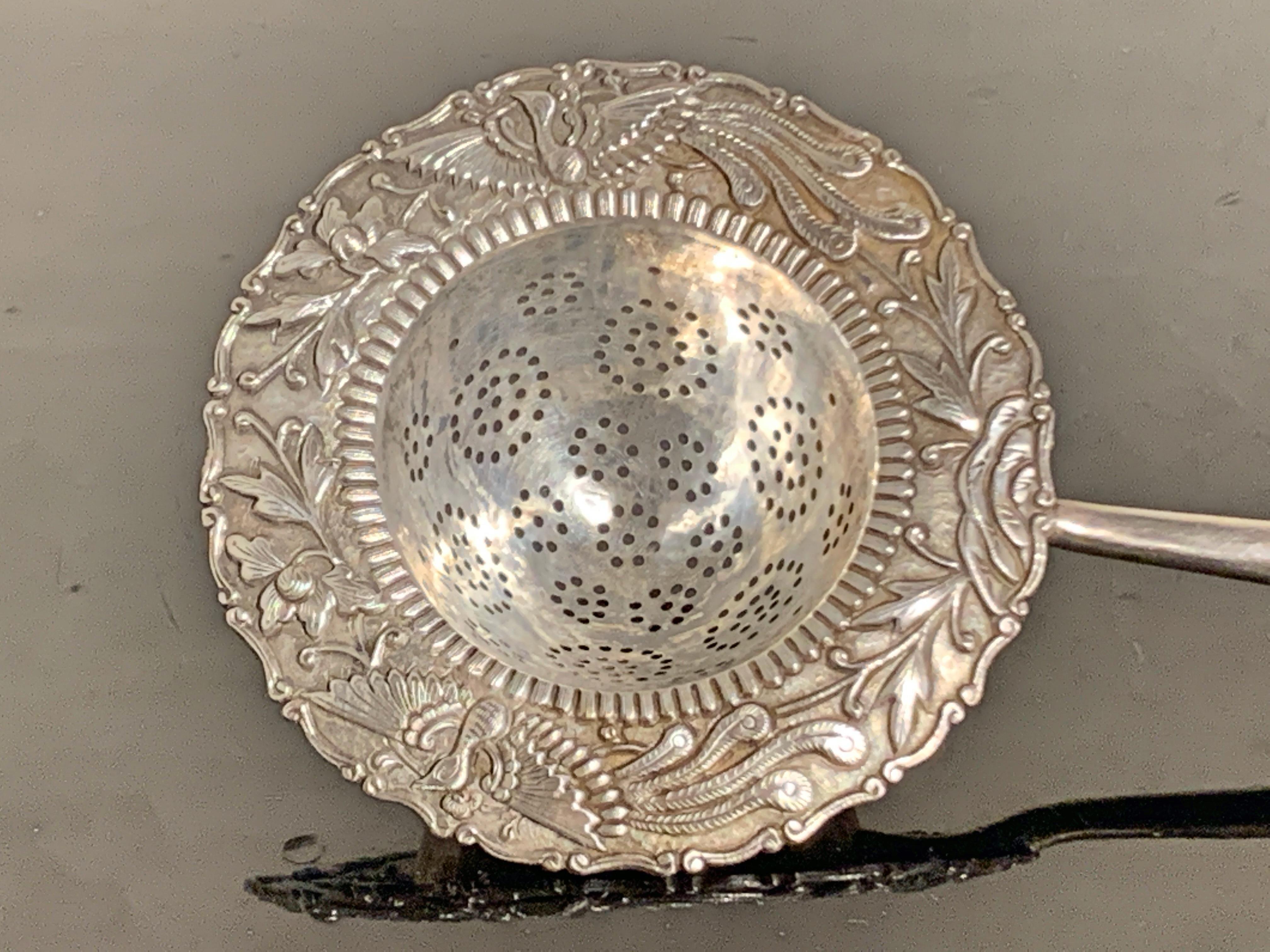 antique tea strainer silver