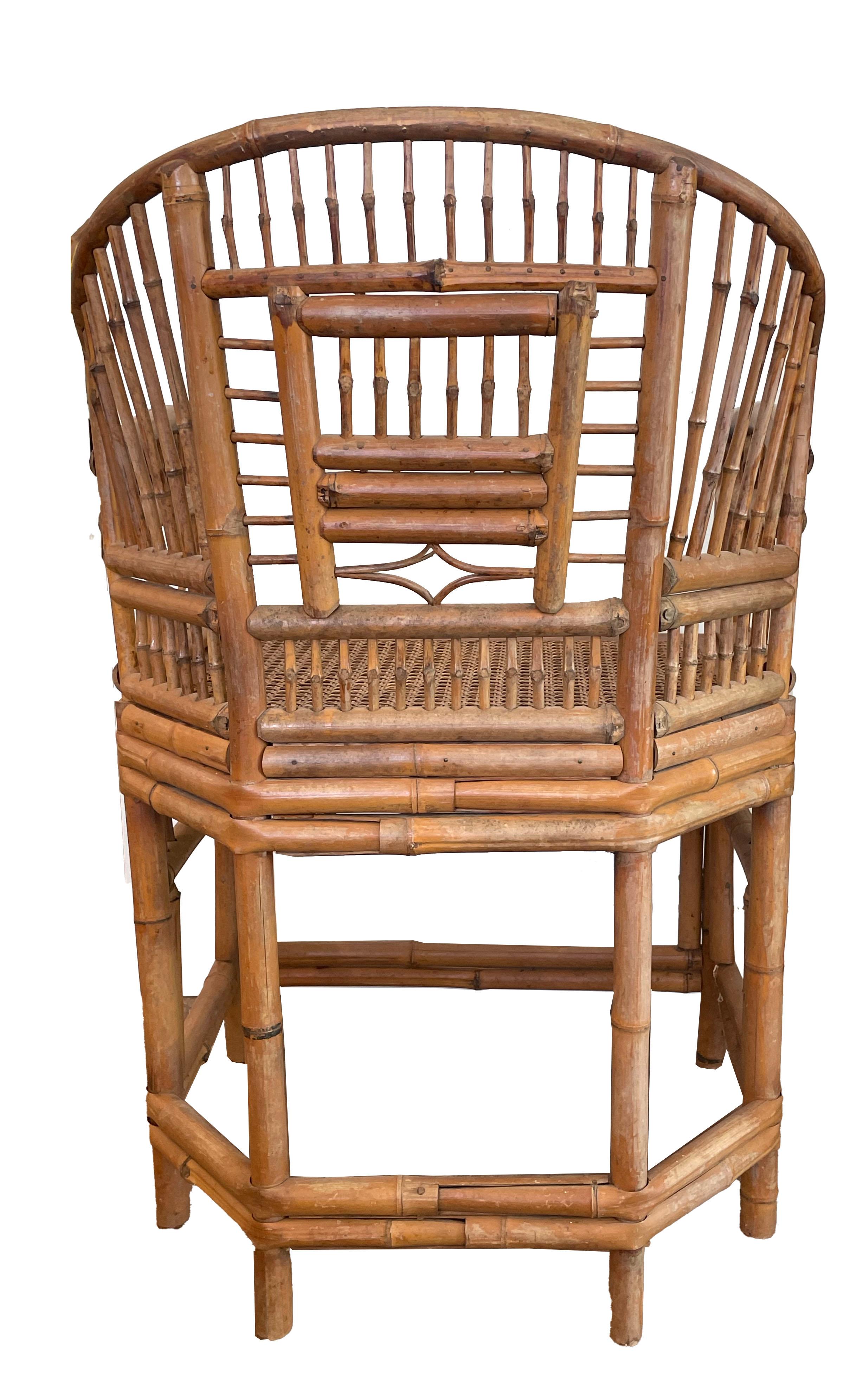 A lovely pair of spindle style bamboo export armchairs with slightly rounded back. good condition.

These chairs show stylistic influences of Chinese Export bamboo furniture made at the beginning of the 19th century for the great chinoiserie rooms