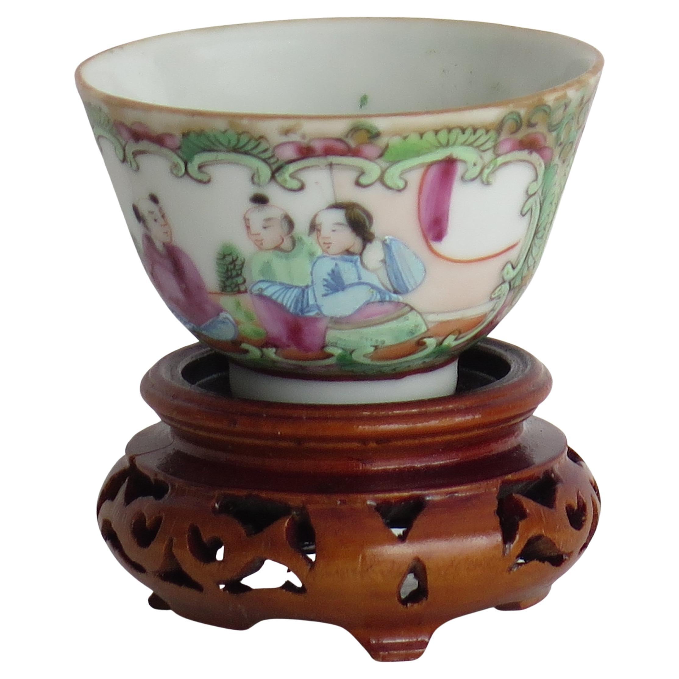 This is a fairly small Chinese Export Tea Bowl, all hand decorated in the Canton Famille Rose Medallion pattern and comes complete wit a carved hardwood stand, all dating to the early 19th Century of the Qing period, Circa 1830.

Chinese Rose