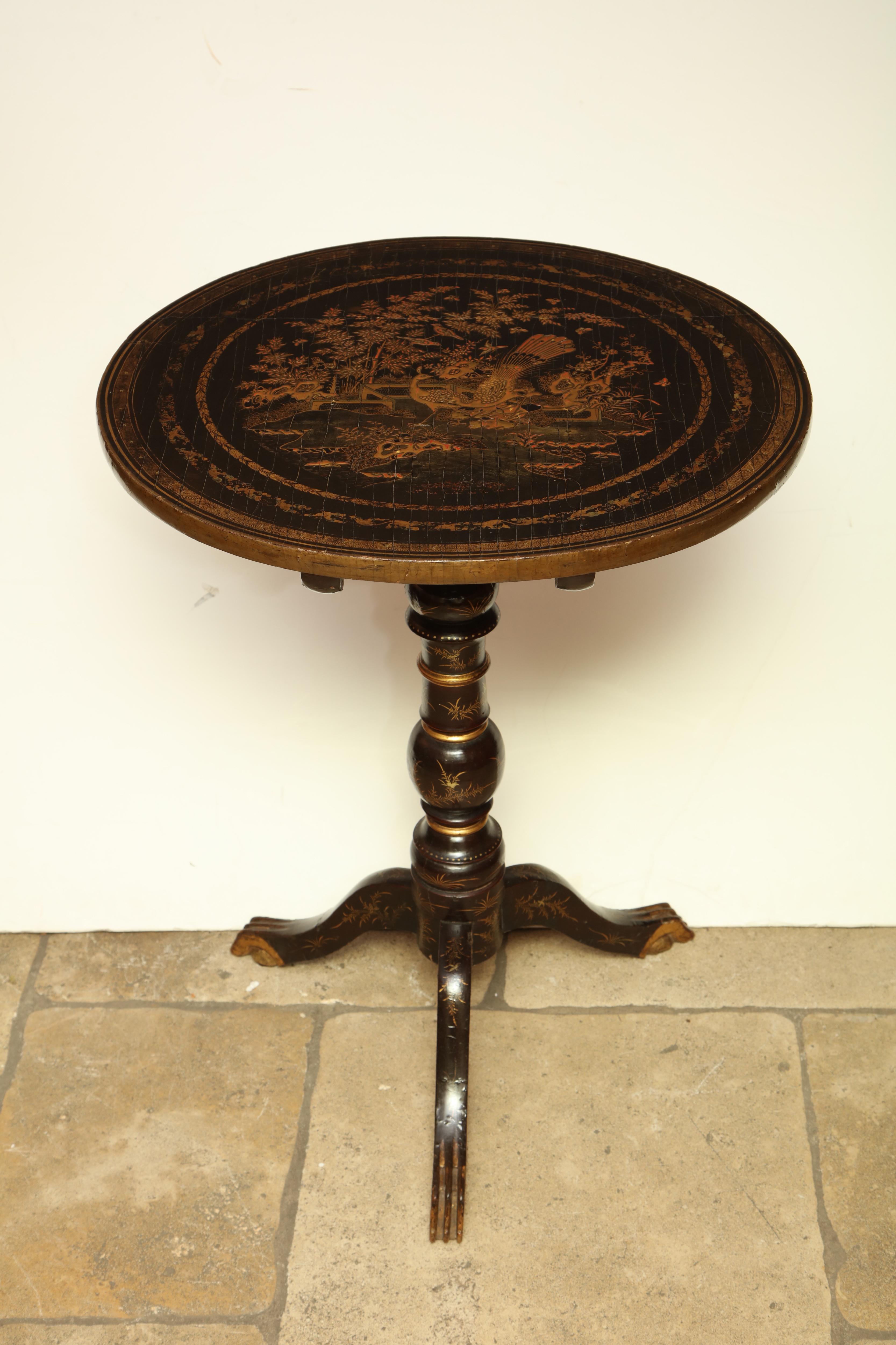 Chinese export lacquered and japanned round tilt top pedestal side table.