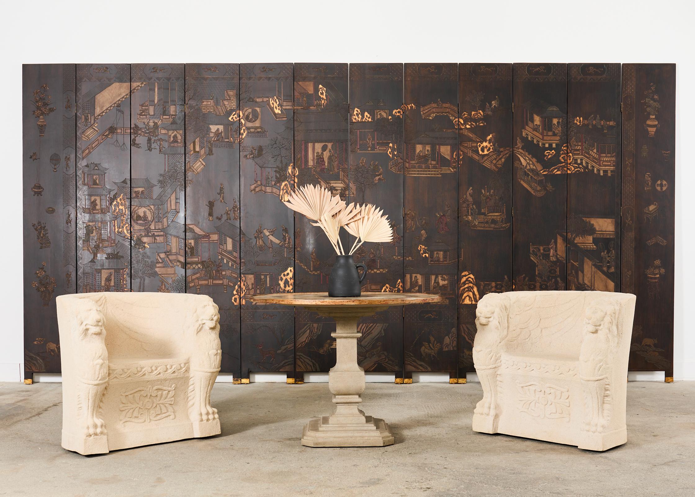 Gorgeous Chinese export 12 panel coromandel style screen featuring an image of Han Palace. The screen is intentionally aged and distressed to appear as an 18th-century Qing dynasty screen depicting Weiyang palace landscape. Crafted from veneered