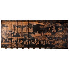 Chinese Export Twelve-Panel Lacquered Parcel-Gilt Coromandel Screen