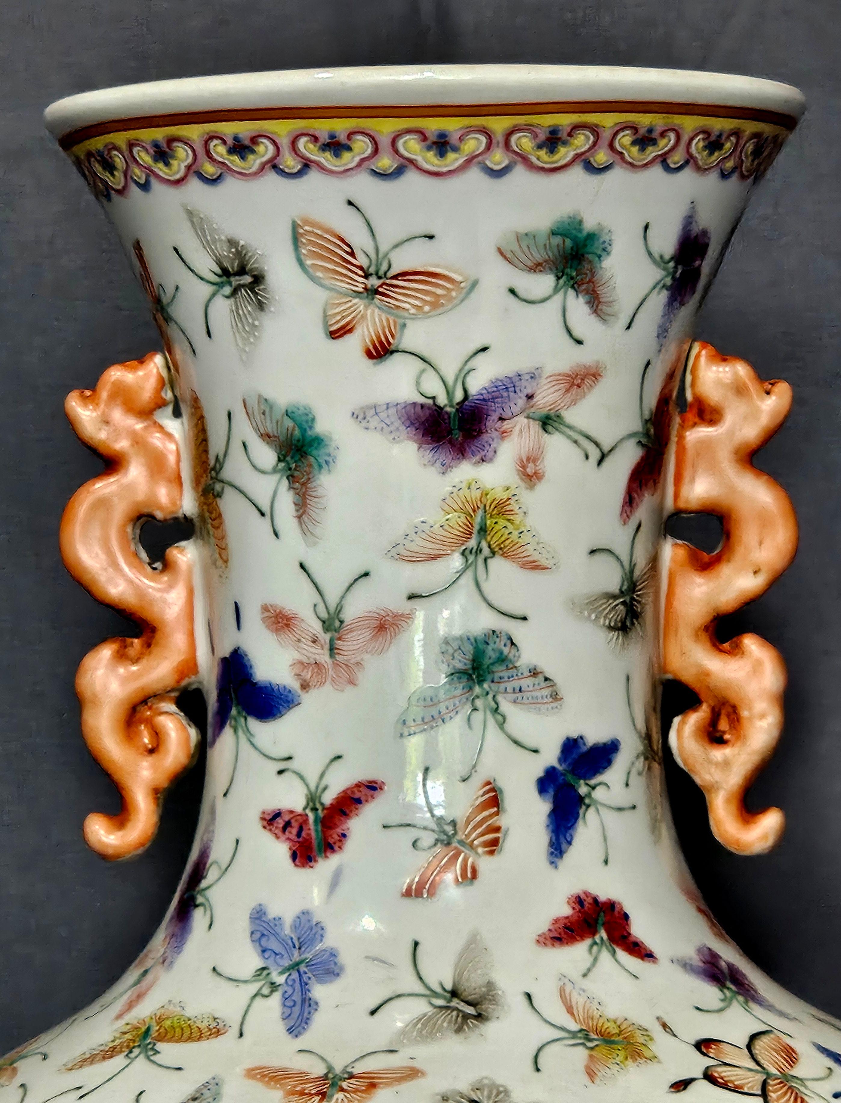 Chinese Polychrome Glaze Vase with Hundreds of Hand-Painted Butterflies. Large vase in baluster form with applied handles in the form of qilin, decorated all over the form with colorful butterflies, bearing a spurious six-character mark of the Qing