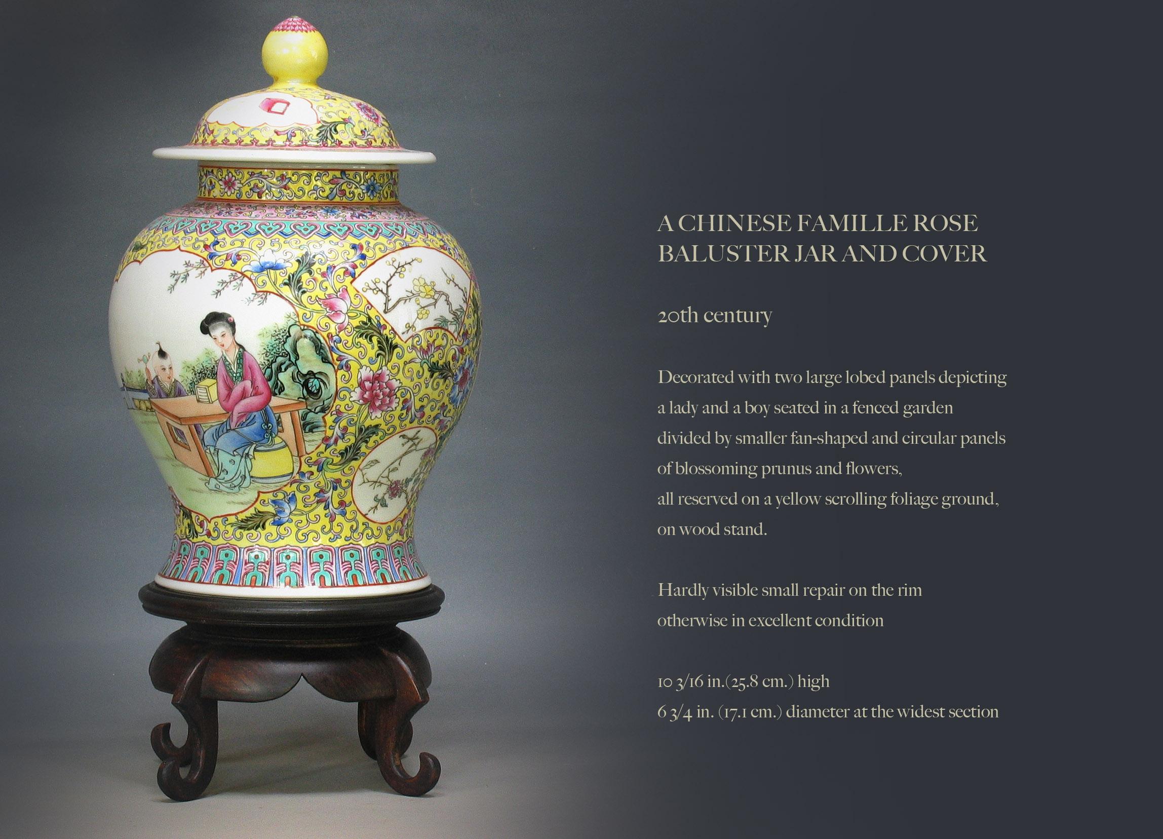 A Chinese famille rose
Baluster jar and cover

20th century.

Decorated with two large lobed panels depicting 
a lady and a boy seated in a fenced garden  
divided by smaller fan-shaped and circular panels 
of blossoming prunus and flowers,