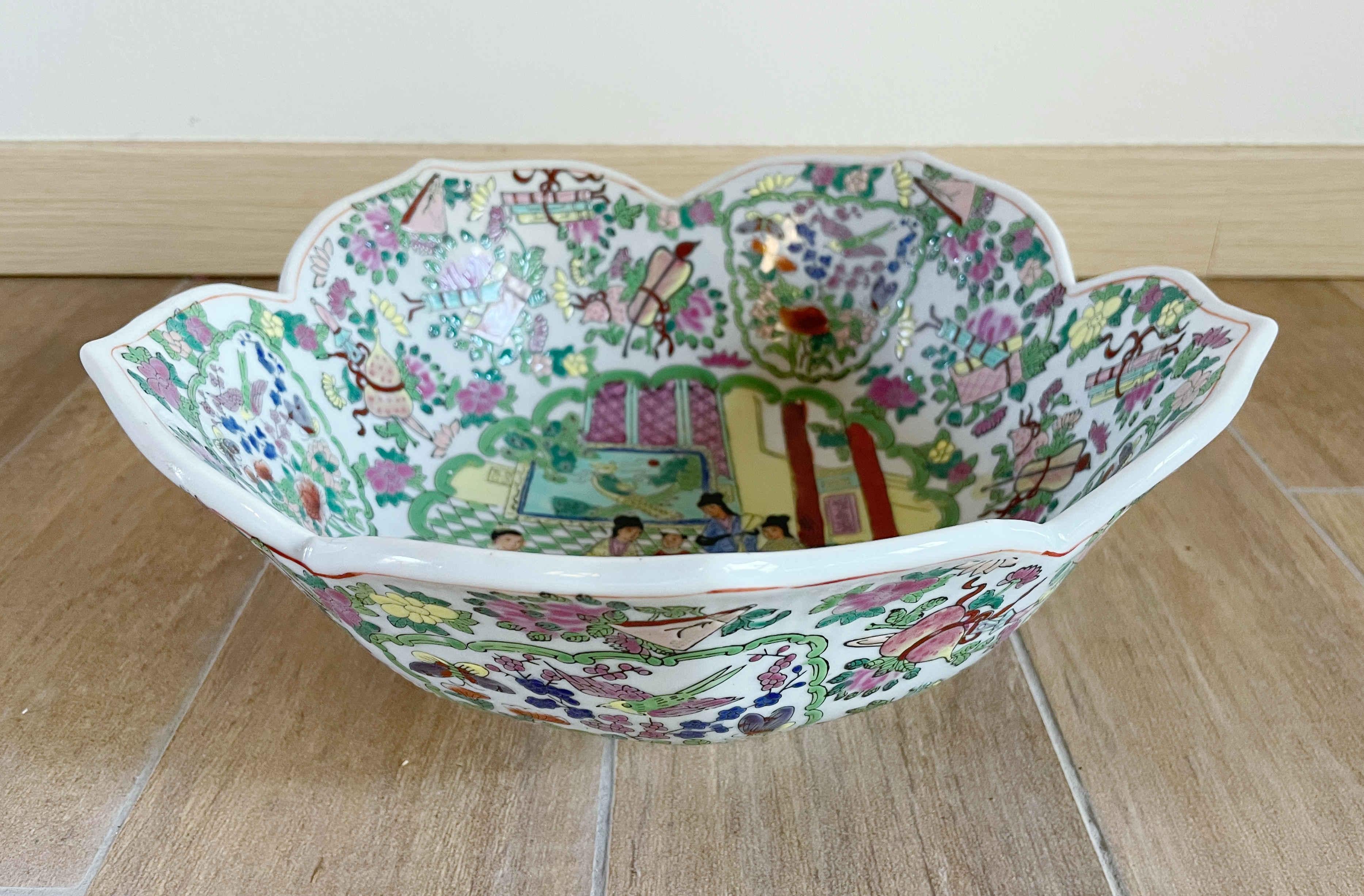 Colorful hand painted Chinese famille rose porcelain bowl with social scenes and nature motifs of butterflies, florals, and birds
Stamped with Qianlong four-character mark
Diameter 12 inches / height 5 inches
1 available in stock in Italy
Order