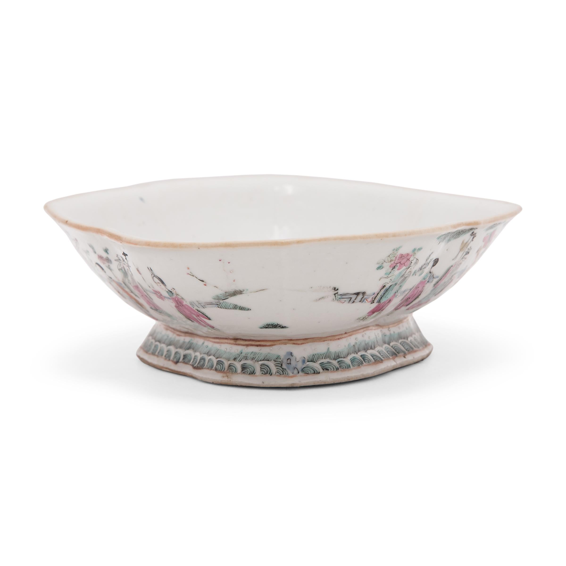 This colorful porcelain bowl dates to the mid-19th century and was originally used as a serving dish for ritual offerings, placed before a home altar and piled high with fruit, baked goods, and other foods. The cartouche-shaped dish features a short