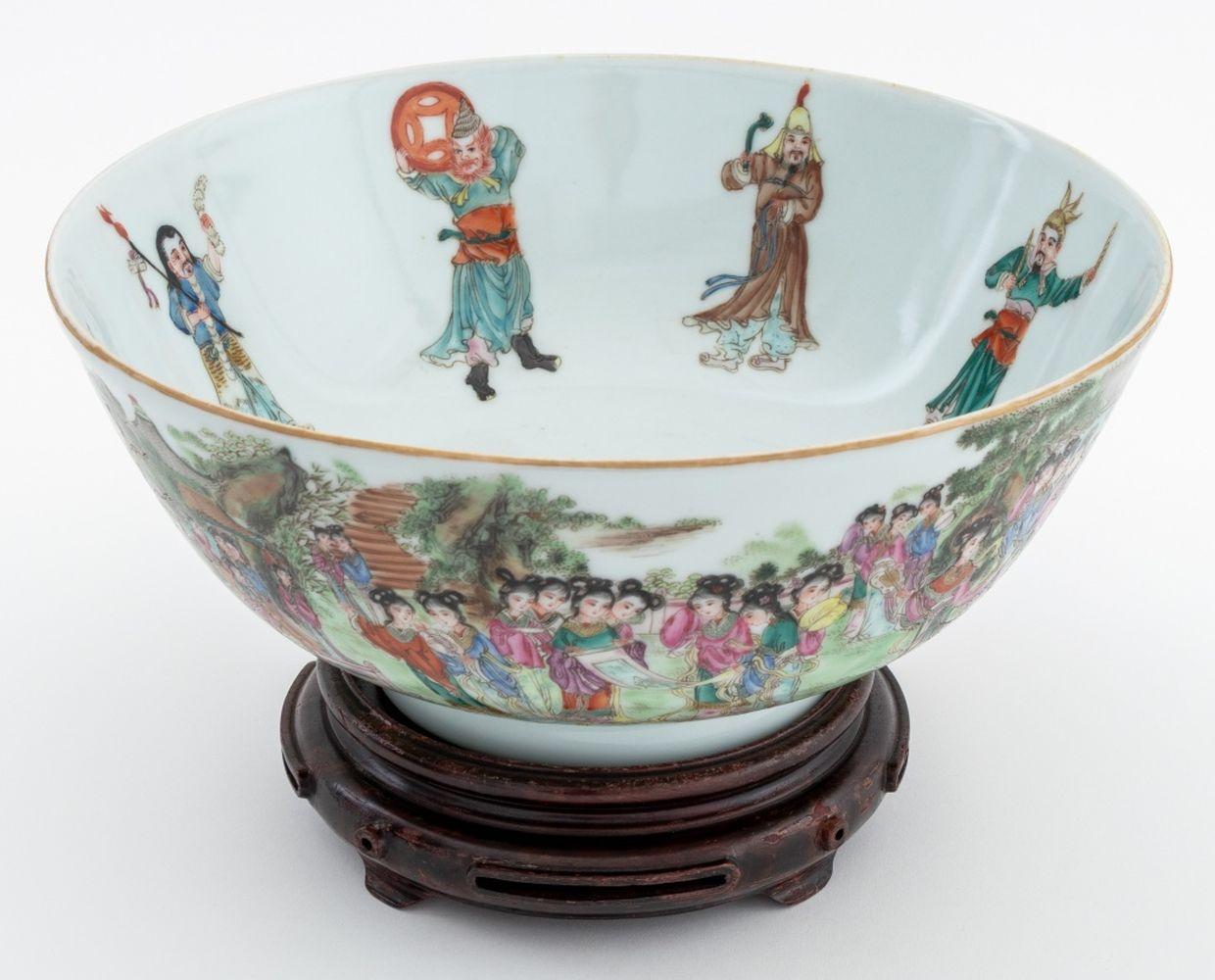 Chinese Famille Rose Porcelain Bowl, hand-enameled with ladies in a landscape scene to exterior and the eight immortals inside, red six character mark to underside, together with hardwood stand. Bowl: 4.5